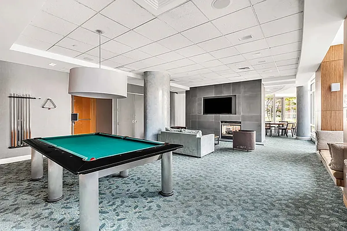 70 Little West Street, Unit 15A Manhattan, NY 10004 - Photo 17 of 19 a room with furniture pool table and flat screen tv