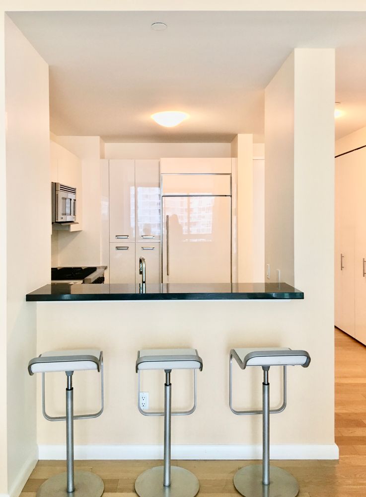 46-30 Center Boulevard, Unit 1102 Queens, NY 11109 - Photo 3 of 26 a bathroom with a window