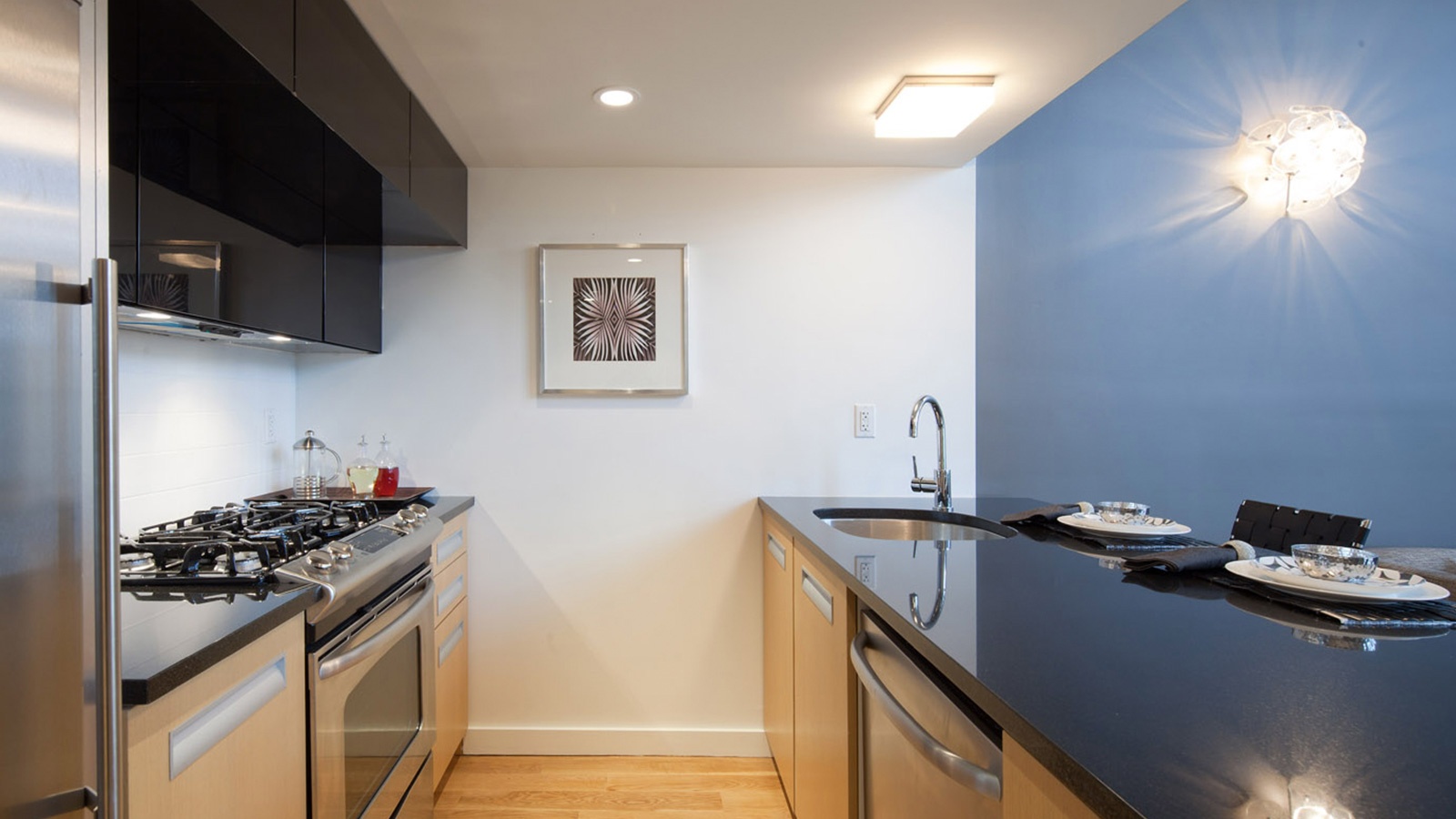 105 Grand Avenue, Unit 4L Brooklyn, NY 11205 - Photo 3 of 10 a kitchen that has a sink and a stove