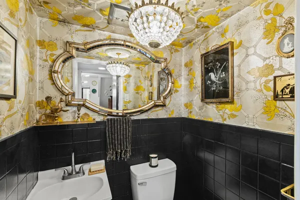 a bathroom with a sink and mirror