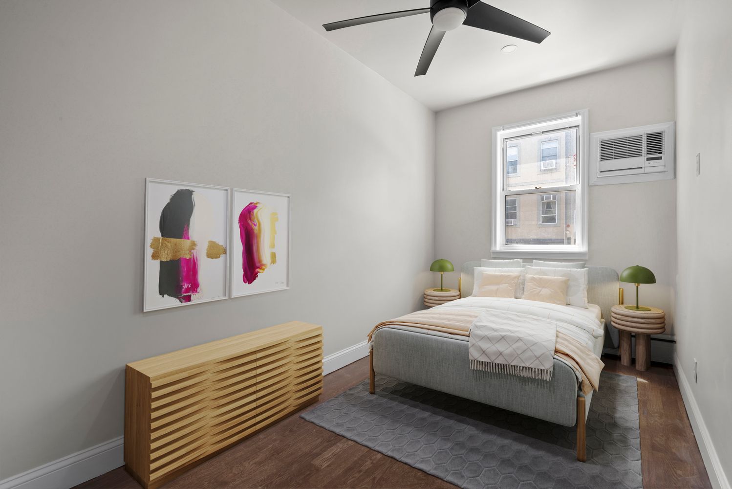 269 Ainslie Street Brooklyn, NY 11211 - Photo 6 of 22 a bedroom with a bed and a painting on the wall