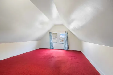 a view of empty room with windows