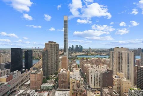 a view of a city with tall buildings