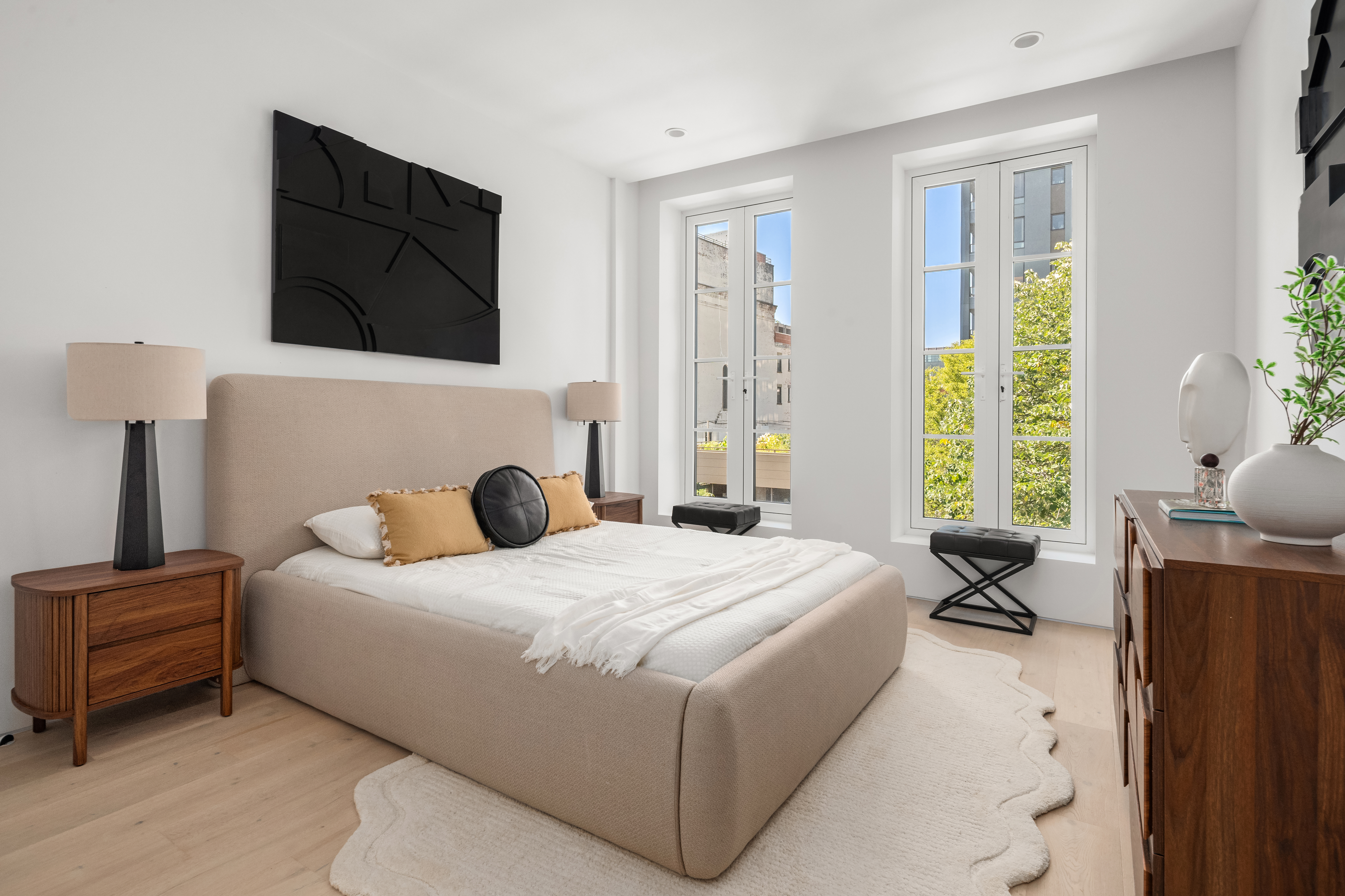 79 South 2nd Street, Unit 2 Brooklyn, NY 11249 - Photo 6 of 14 a bedroom with a bed and wooden floor