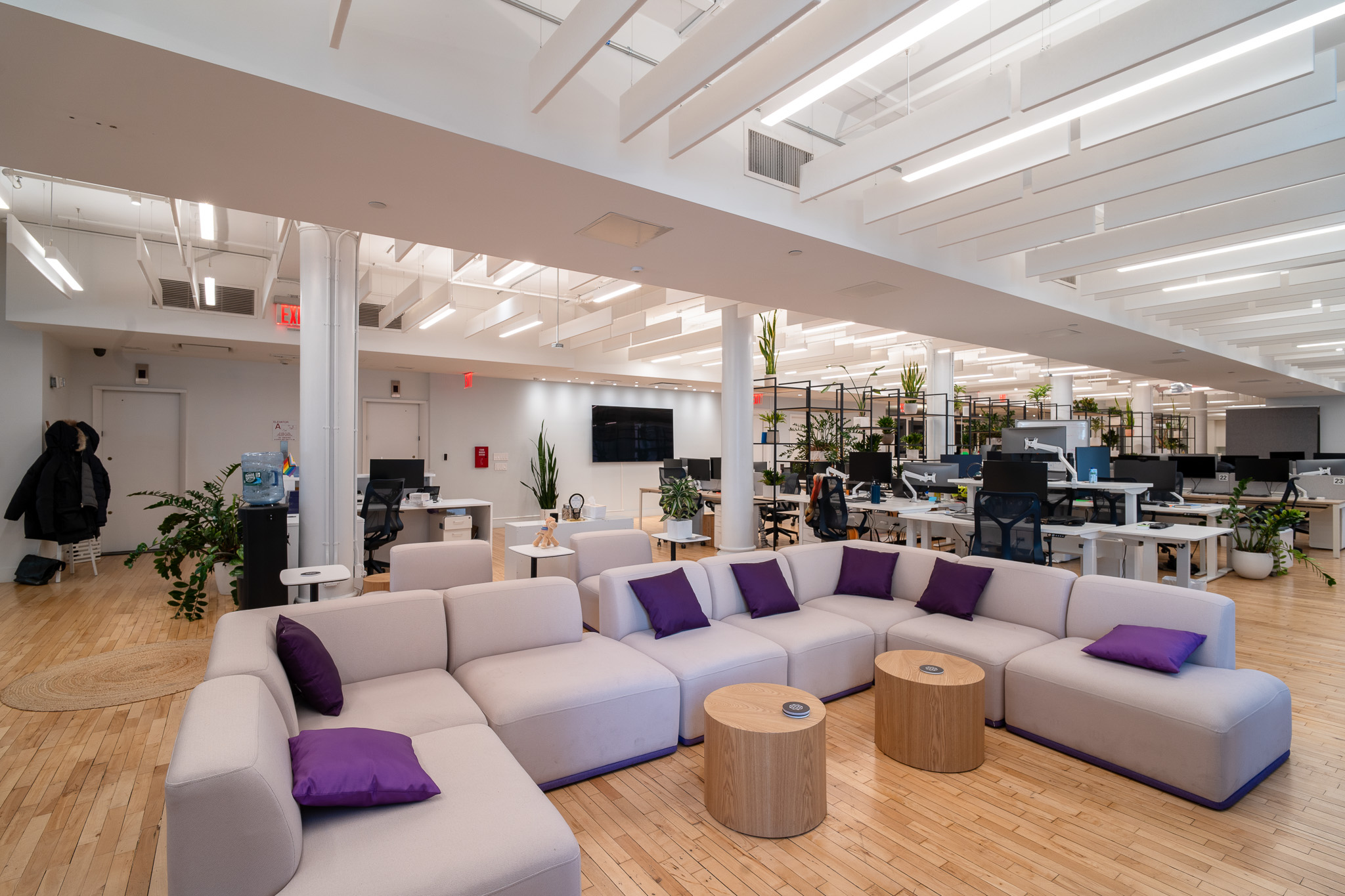 85 5th Avenue, Unit 8 Manhattan, NY 10003 - Photo 5 of 12 a living room with furniture kitchen view and a large window