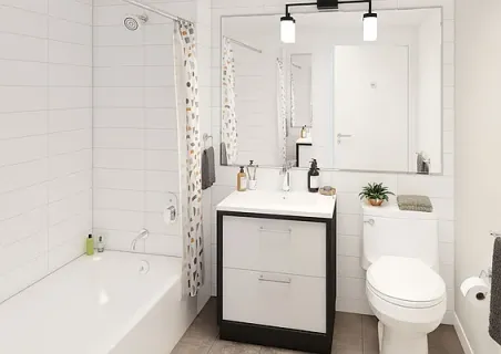 a bathroom with a sink a toilet and bathtub