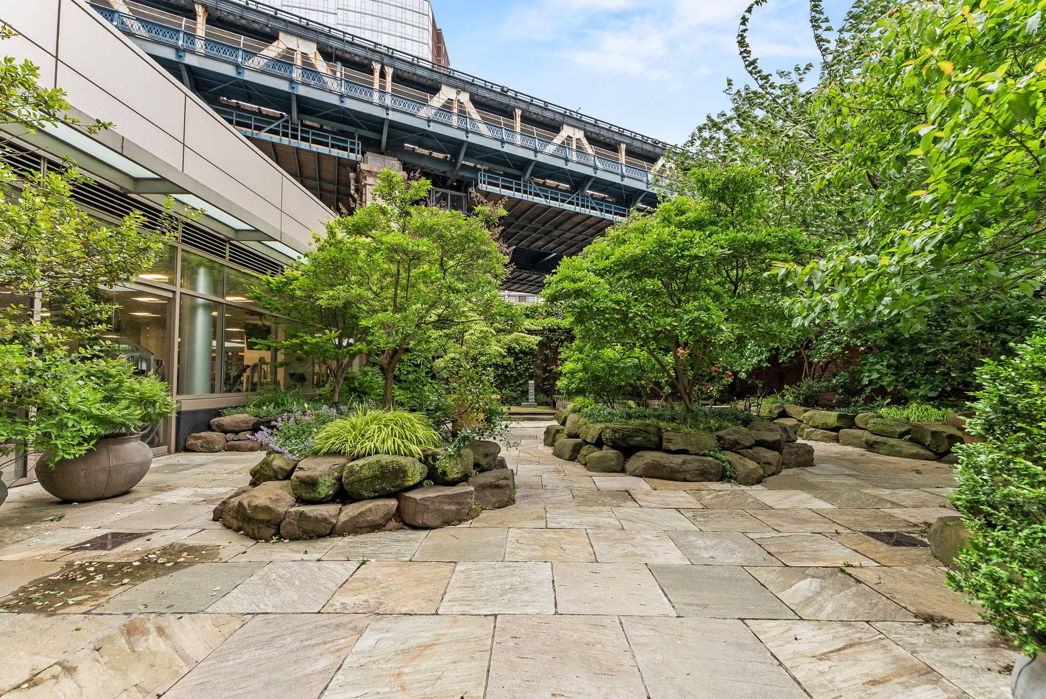 85 Adams Street, Unit 21A Brooklyn, NY 11201 - Photo 16 of 18 a view of a garden with plants
