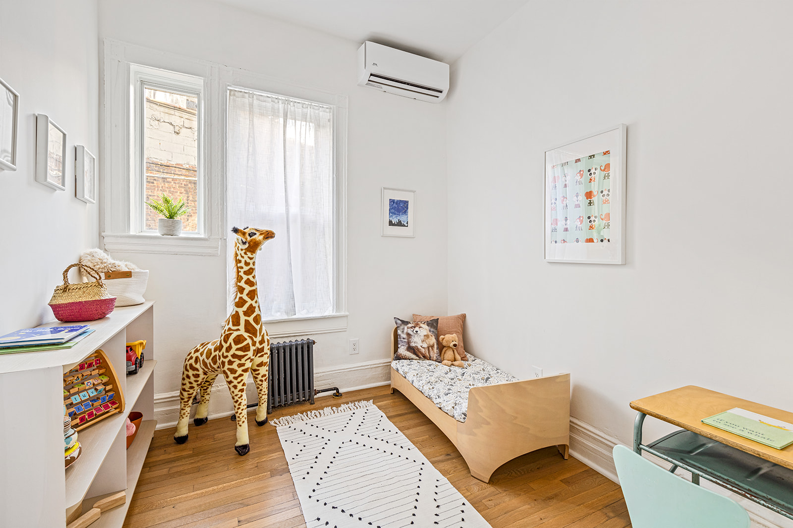 610 Marlborough Road Brooklyn, NY 11226 - Photo 7 of 16 a bedroom with furniture and a window
