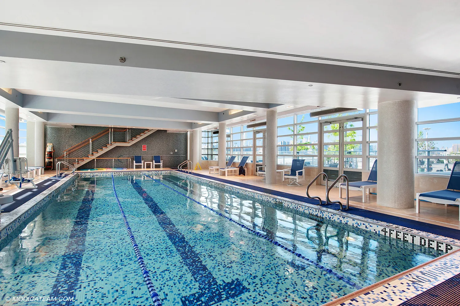 a view of swimming pool with a large window