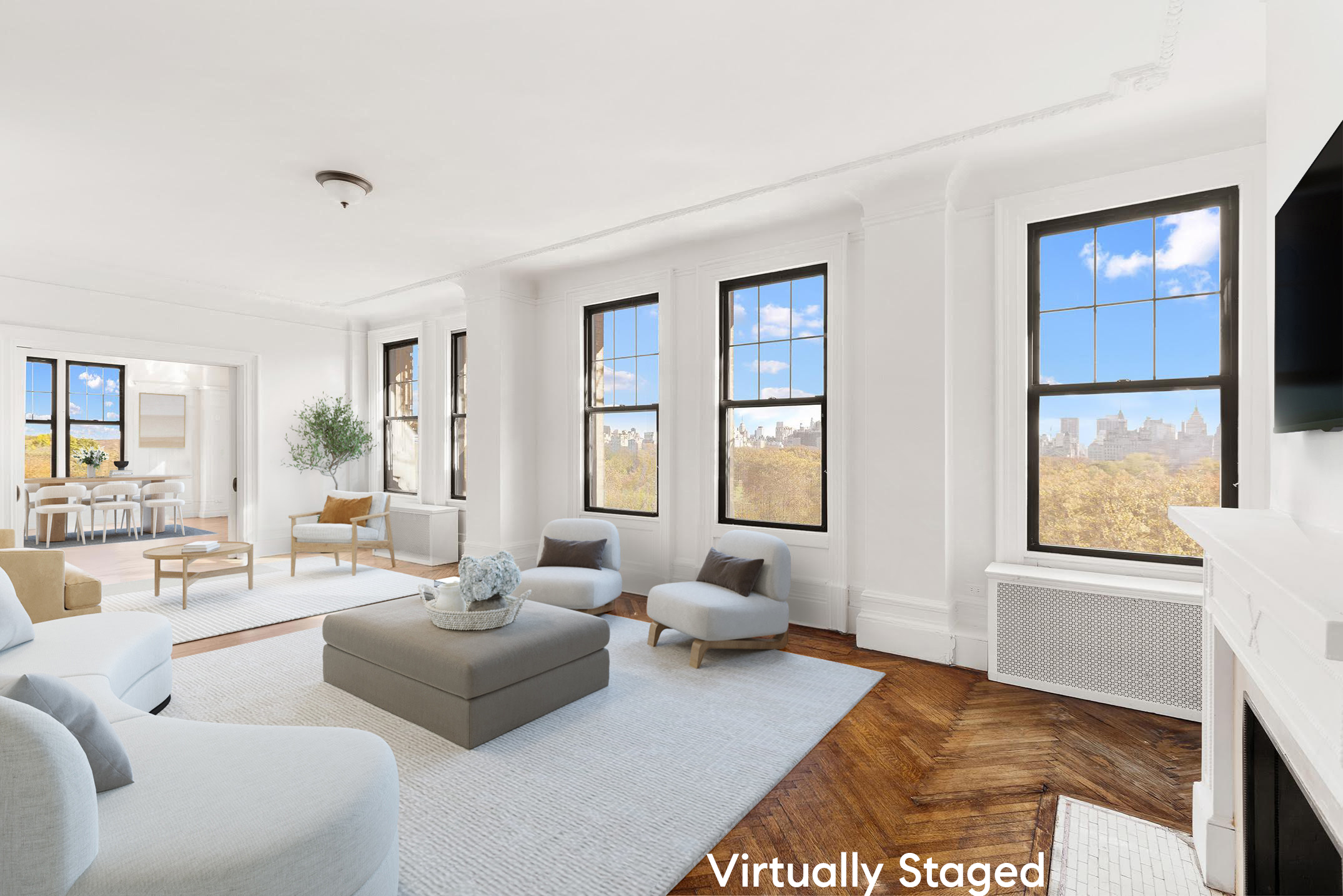 50 Central Park West, Unit 8BB Manhattan, NY 10023 - Photo 1 of 28 a living room with furniture and a large window