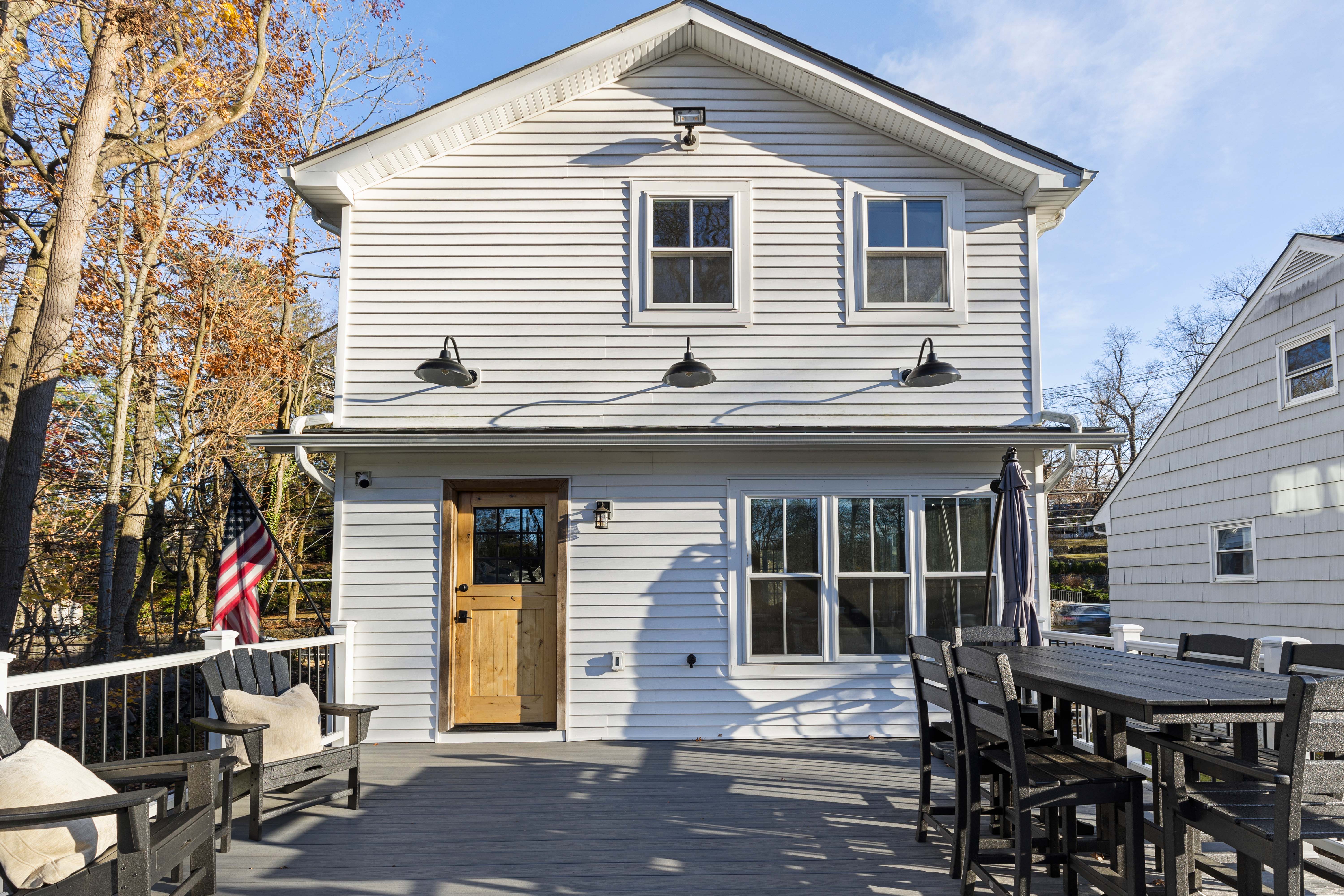 467 Midland Avenue Rye, NY 10580 - Photo 14 of 19 a front view of a house with glass windows