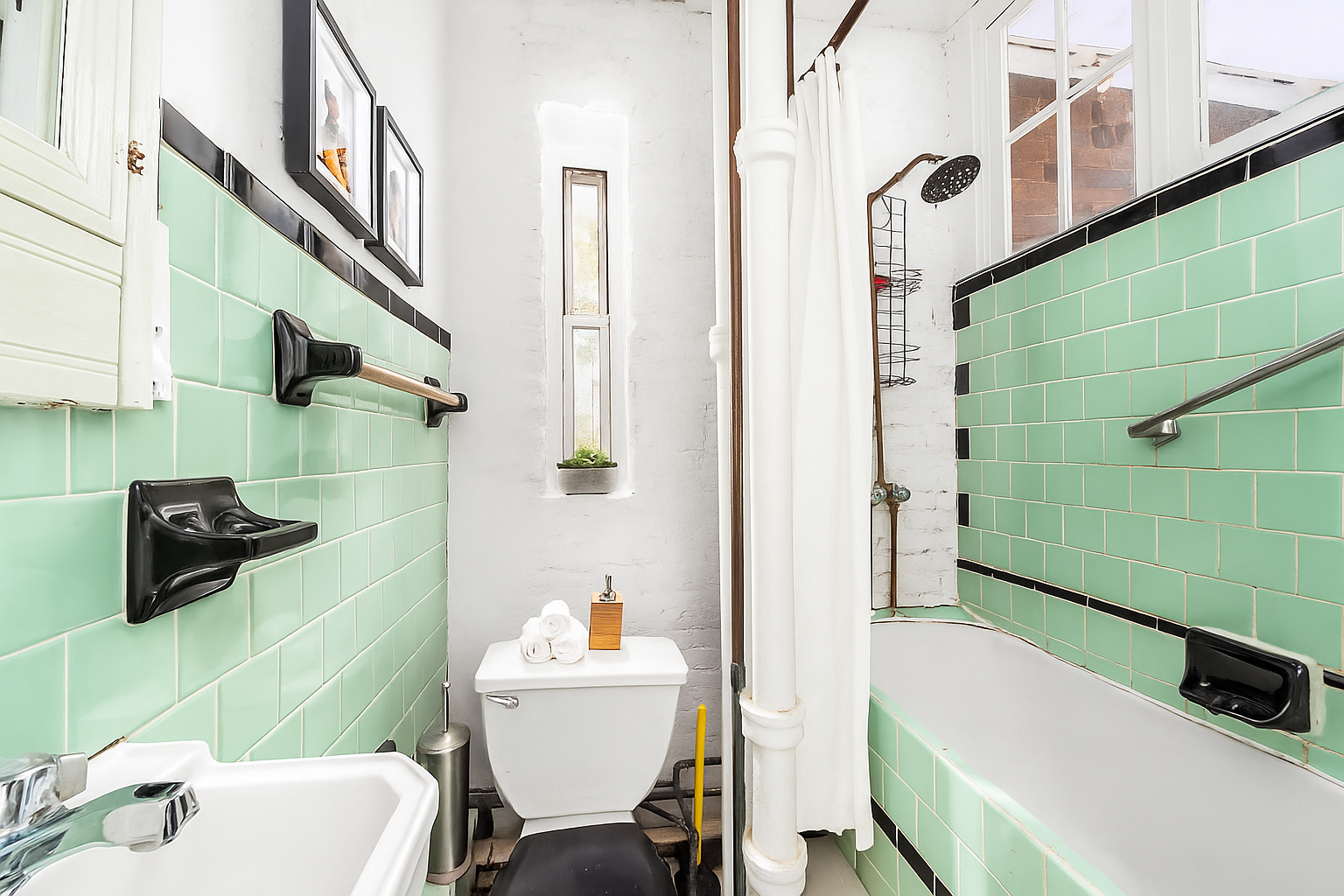 626 East 14th Street, Unit 8 Manhattan, NY 10009 - Photo 10 of 14 a bathroom with a sink a toilet and shower
