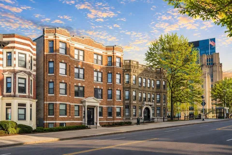 a view of a building and a street