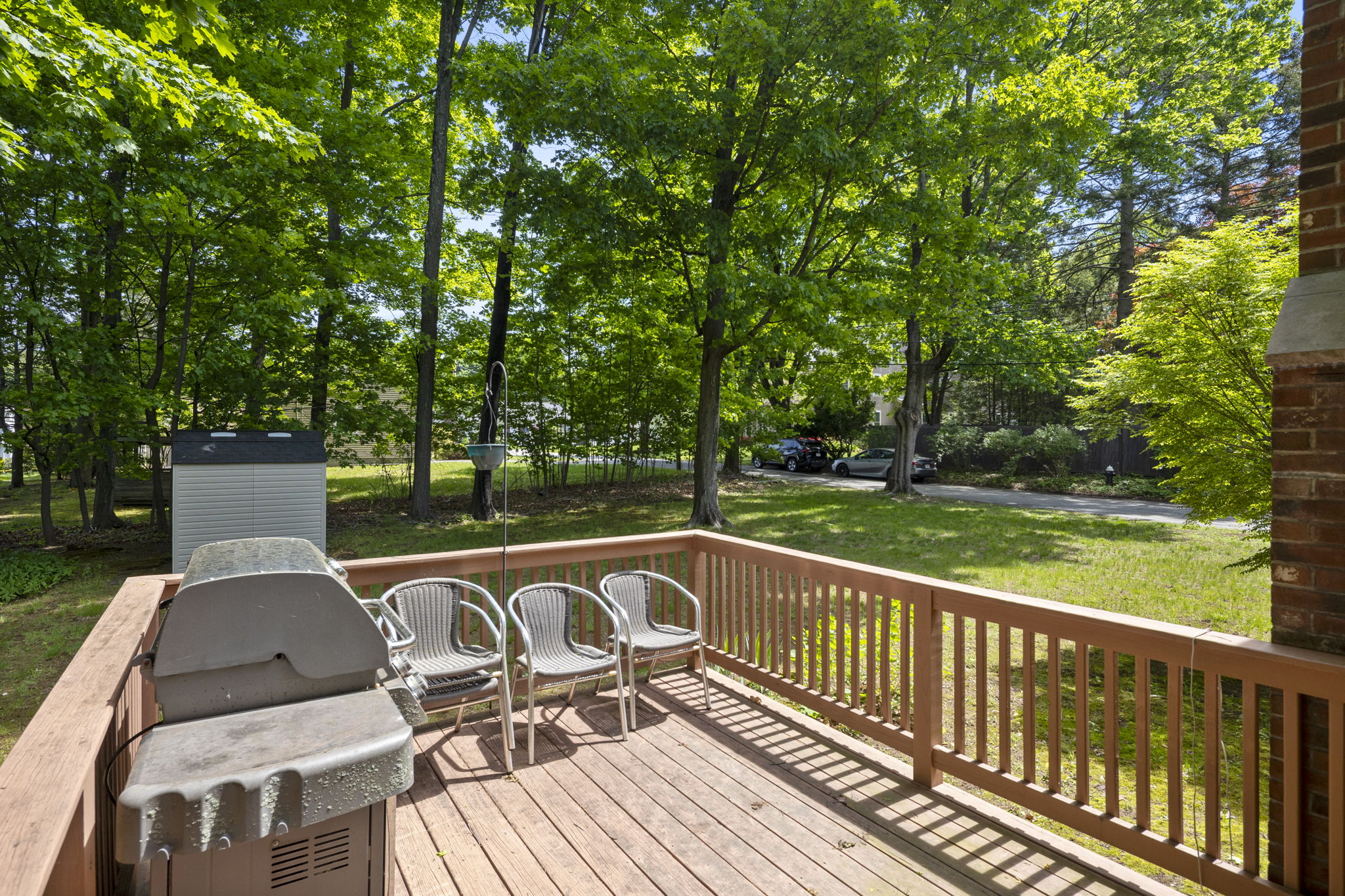 2 Laurel Street Lexington, MA 02421 - Photo 3 of 46 a view of a patio with table and chairs and wooden floor