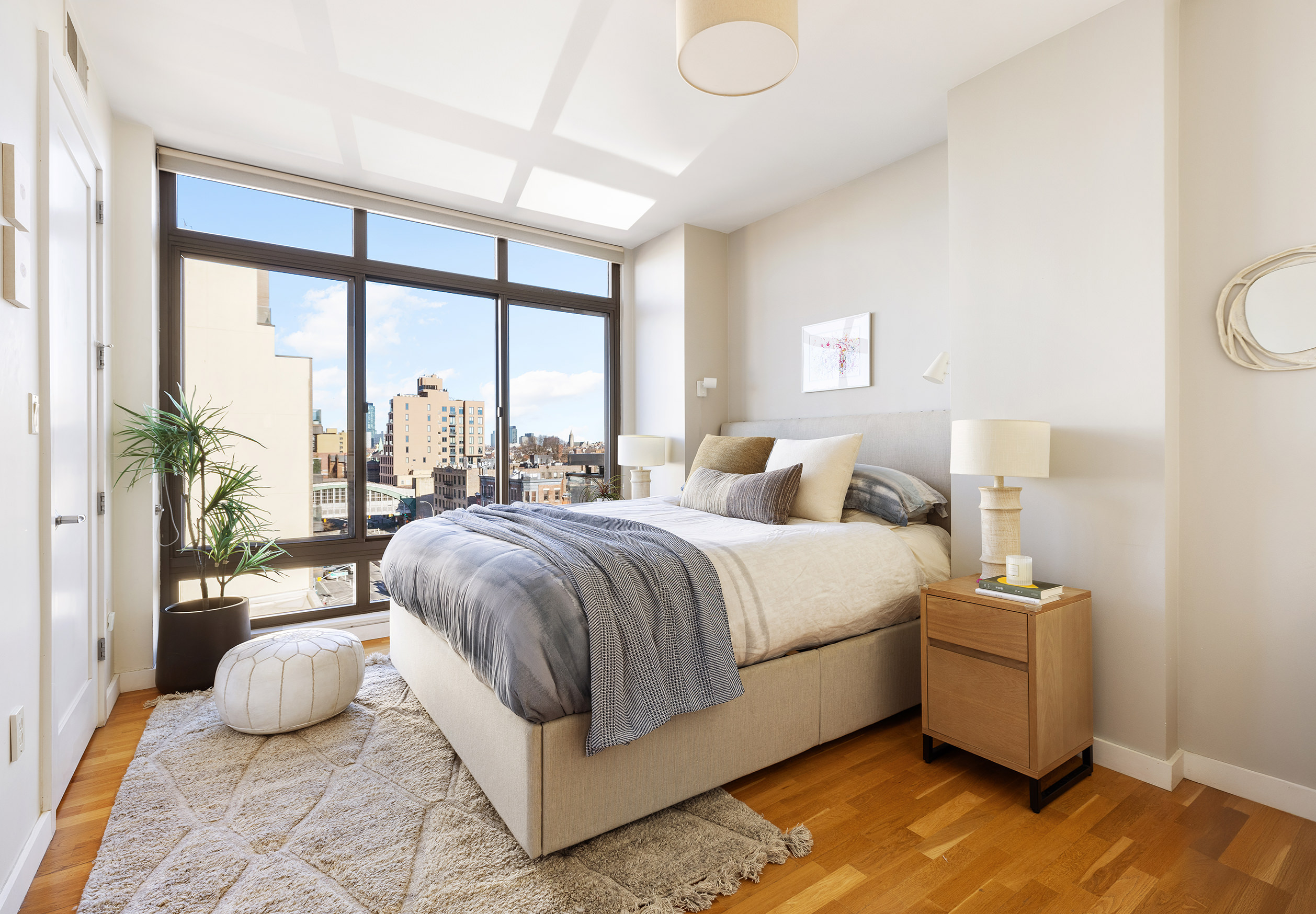 500 4th Avenue, Unit 7C Brooklyn, NY 11215 - Photo 5 of 12 a bedroom with a bed and a large window