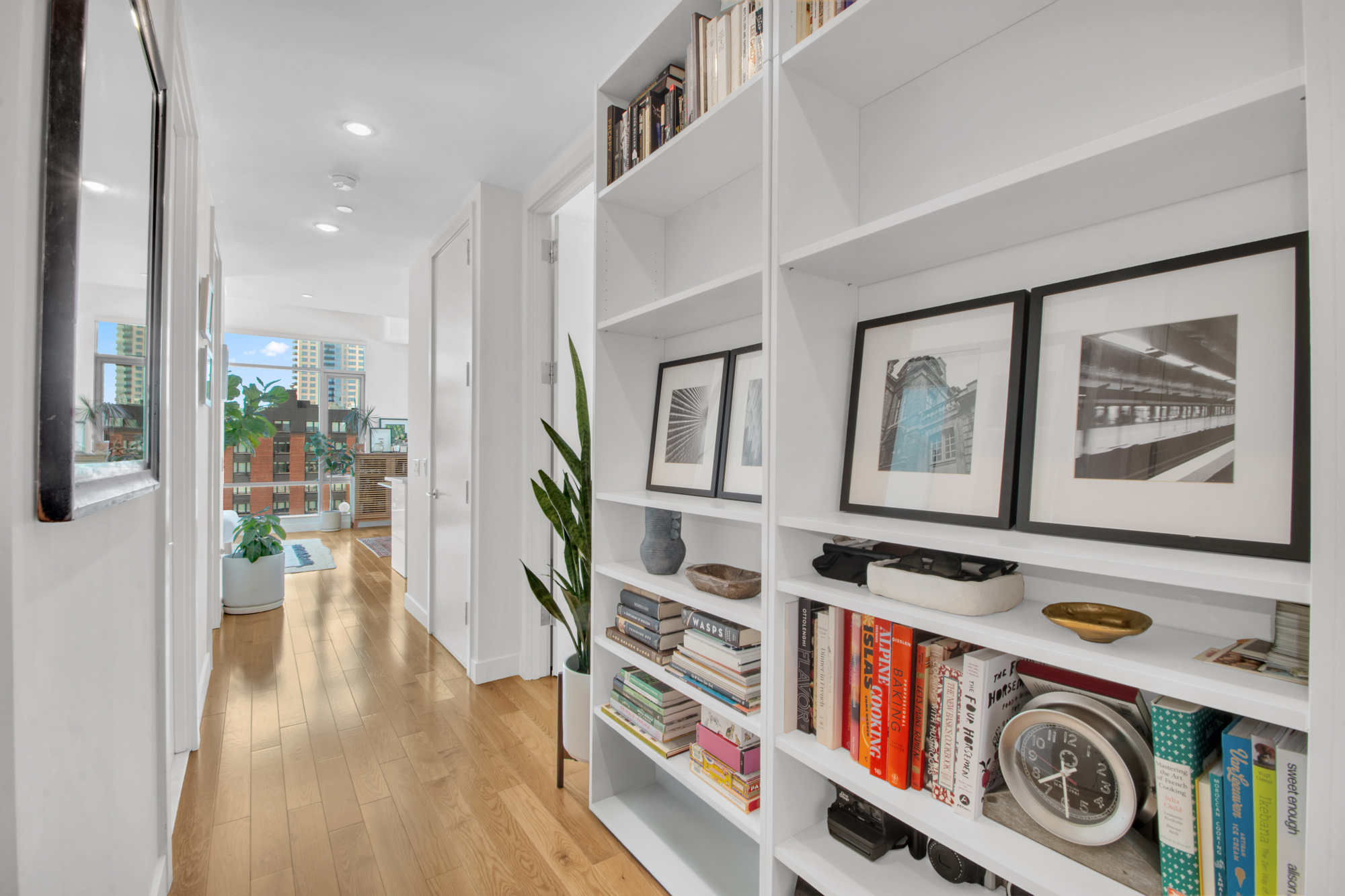101 North 5th Street, Unit 5A Brooklyn, NY 11249 - Photo 11 of 26 a view of washer and dryer with wooden floor