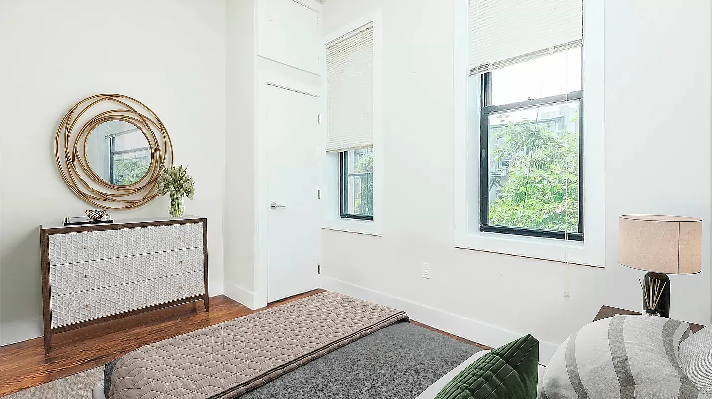 285 Cornelia Street, Unit L3 Brooklyn, NY 11221 - Photo 3 of 10 a bedroom with a bed and a dresser