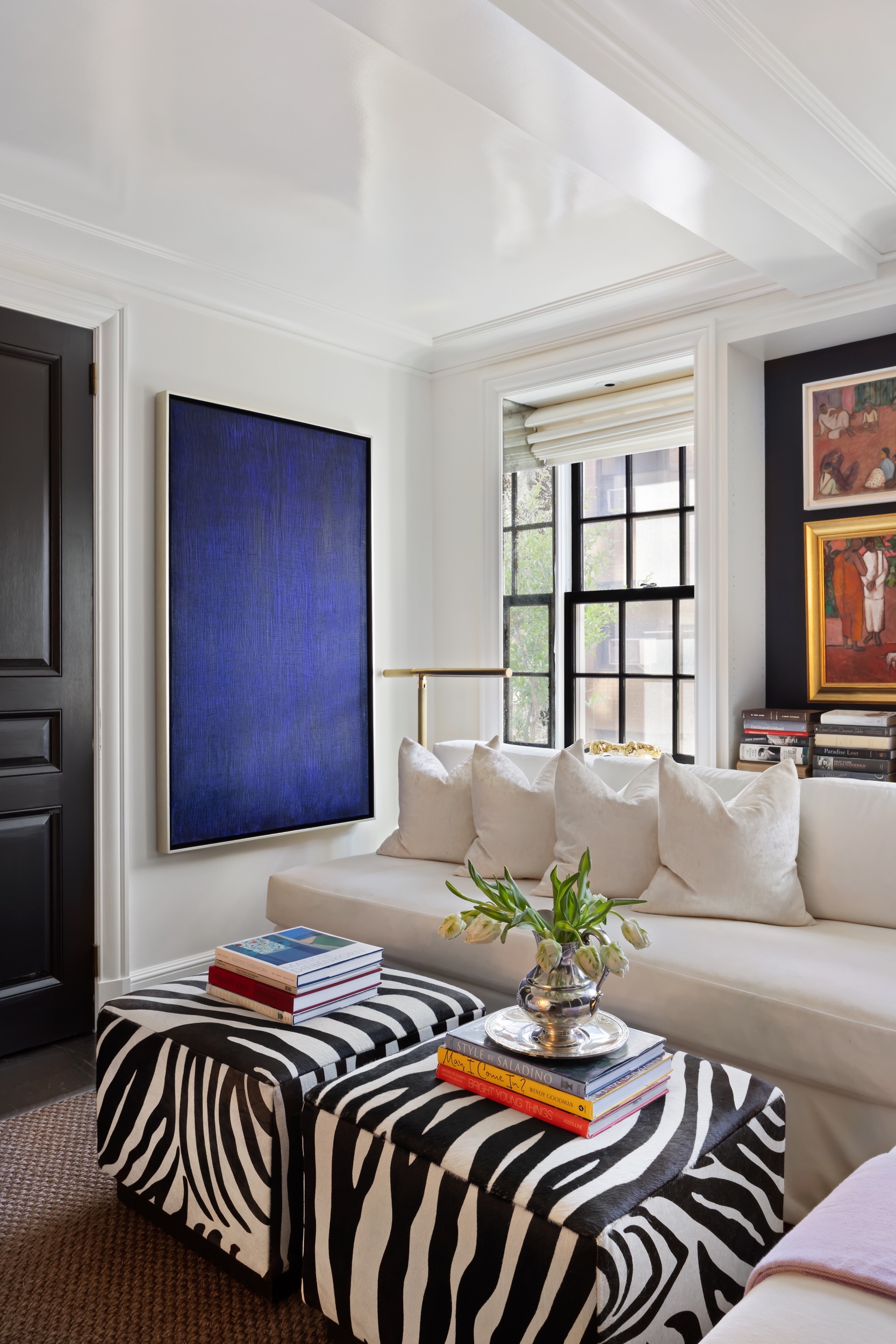 170 East 78th Street, Unit 8E Manhattan, NY 10075 - Photo 8 of 16 a bedroom with a bed and a couch