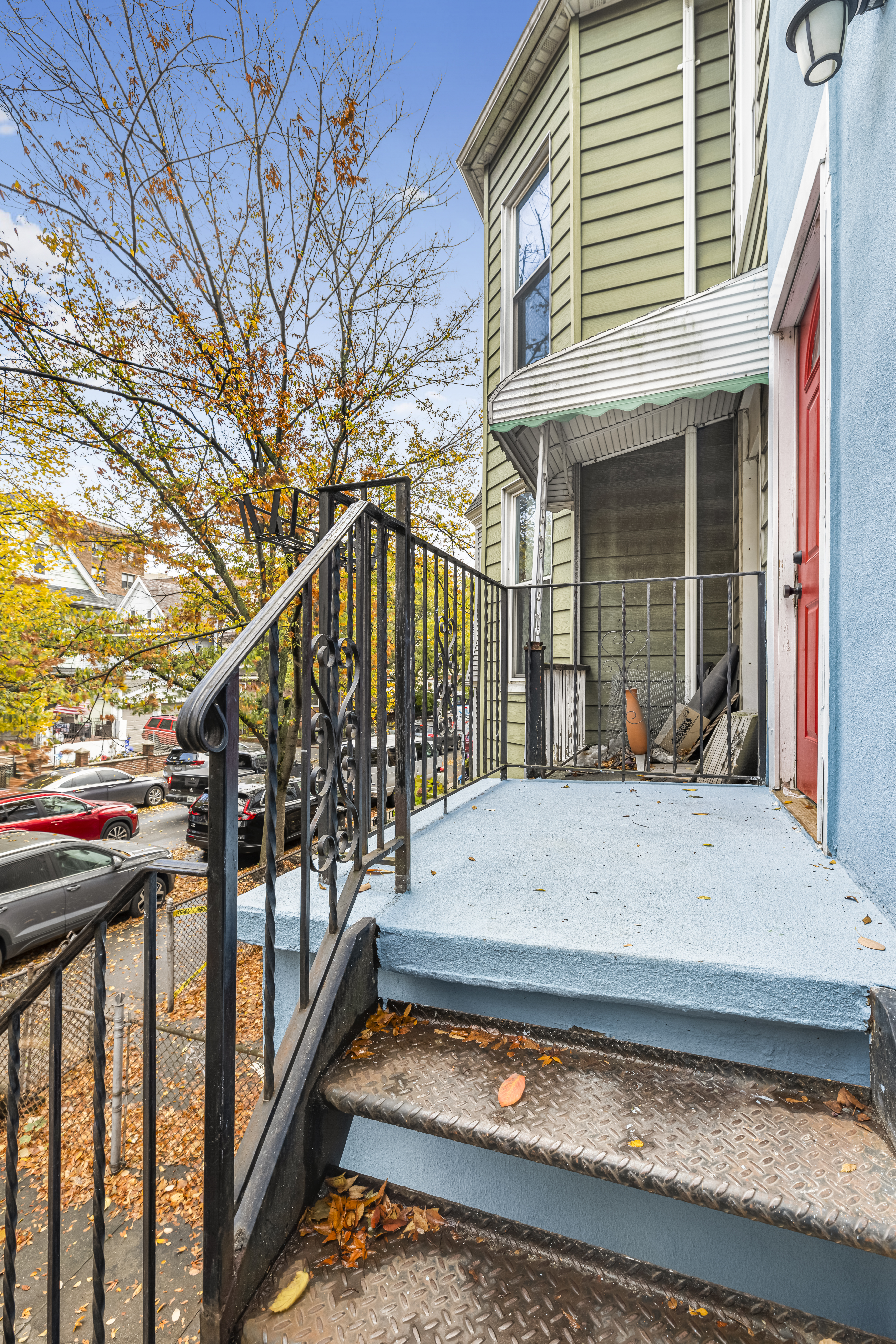 180 East 5th Street, Unit 2 Brooklyn, NY 11218 - Photo 12 of 14 a view of a wooden balcony