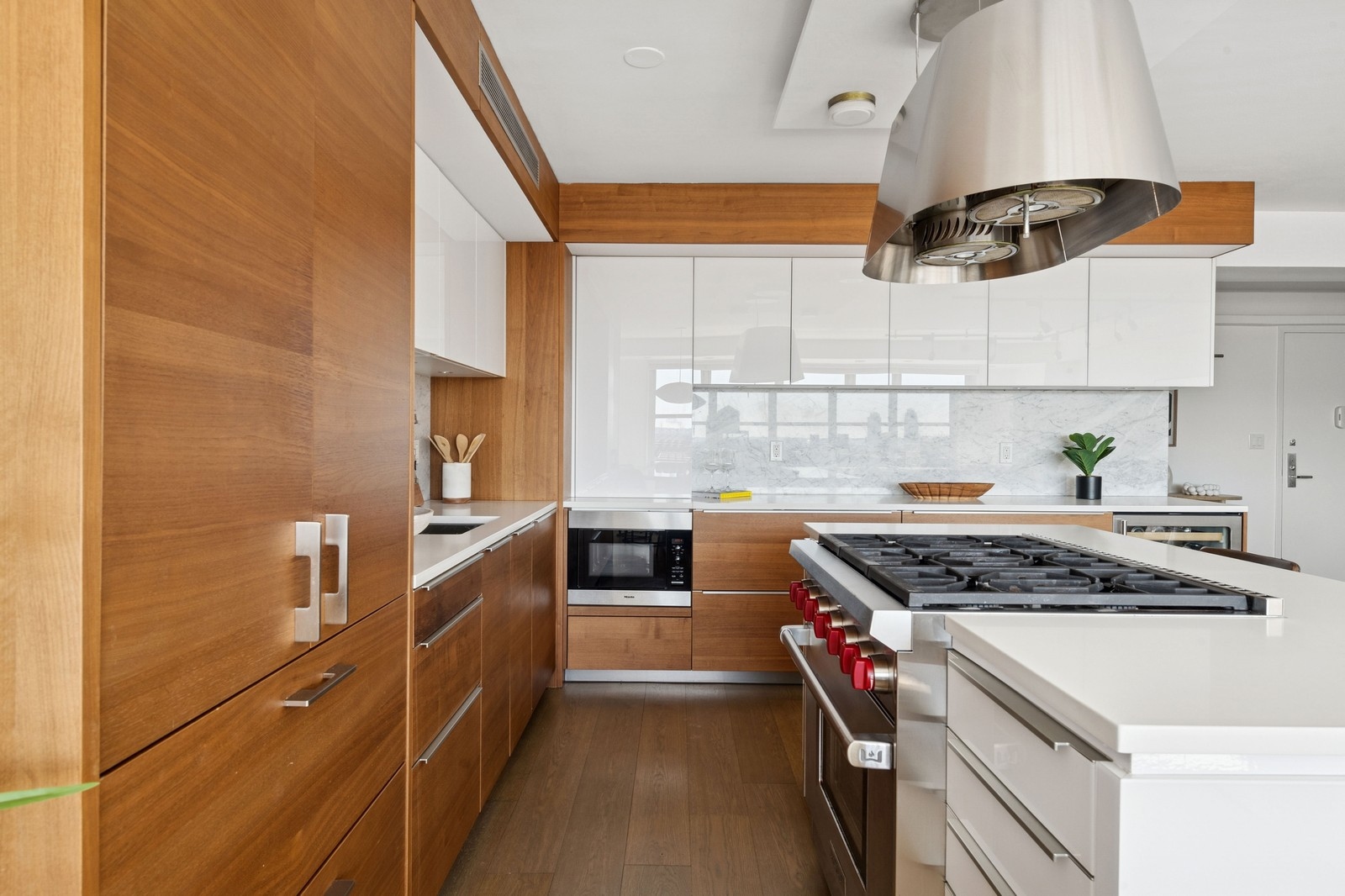 205 3rd Avenue, Unit 21H Manhattan, NY 10003 - Photo 3 of 17 a kitchen with stainless steel appliances granite countertop a stove a sink and a refrigerator