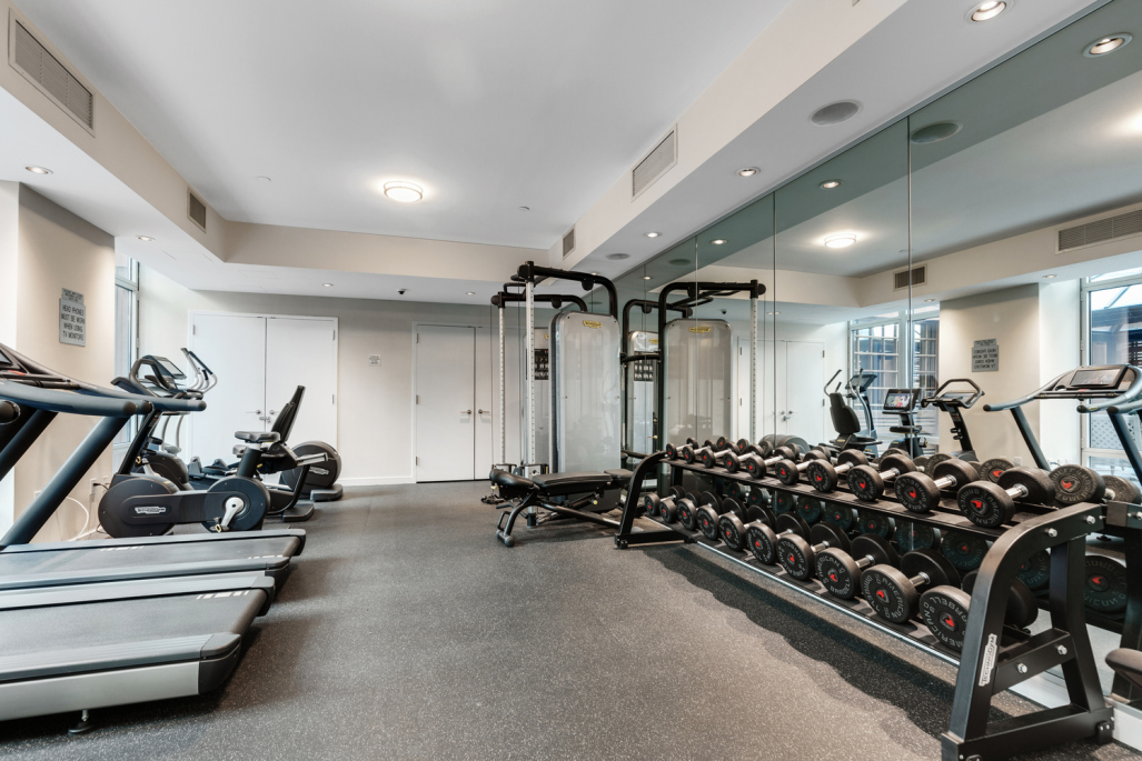 207 East 57th Street, Unit 34A Manhattan, NY 10022 - Photo 19 of 22 a view of a room with gym equipment