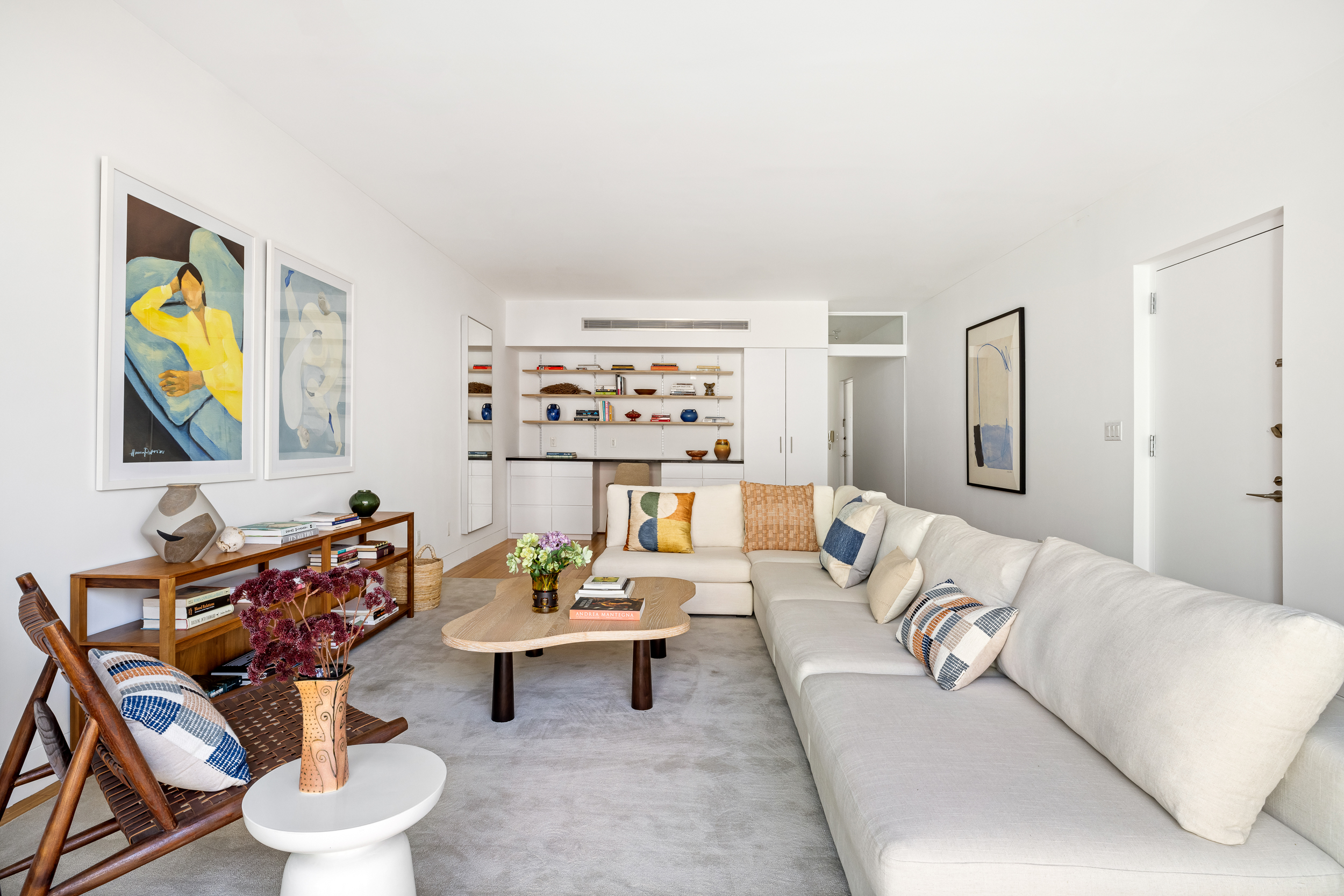 361 Manhattan Avenue, Unit 3AB Brooklyn, NY 11211 - Photo 16 of 21 a living room with furniture and a potted plant
