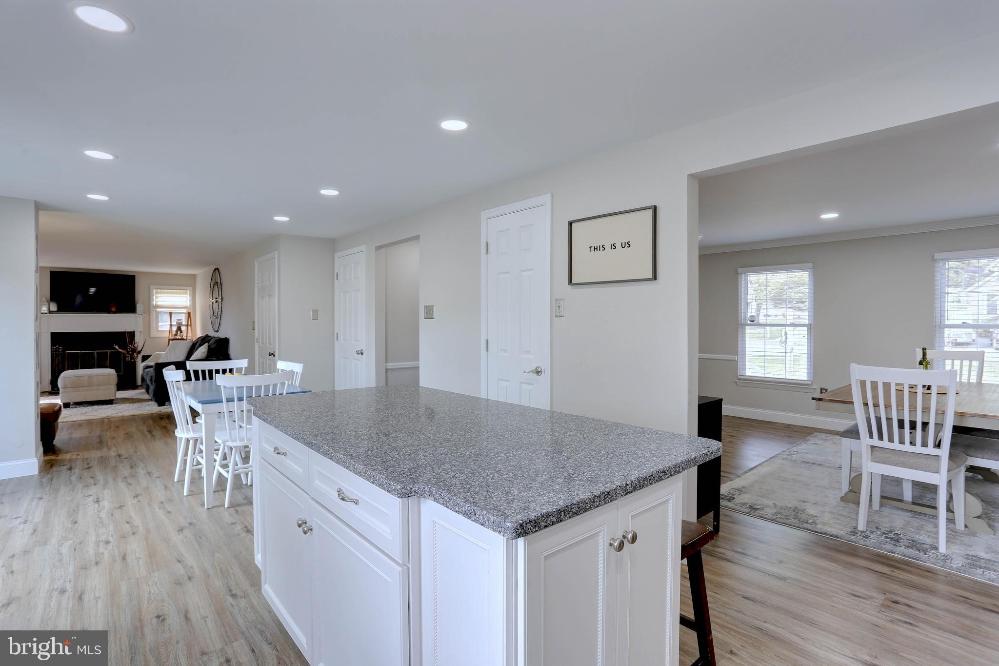 6257 Fairbourne Court Hanover, MD 21076 - Photo 11 of 47 a kitchen with a table and chairs in it