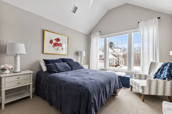 a bed room with a bed and a couch