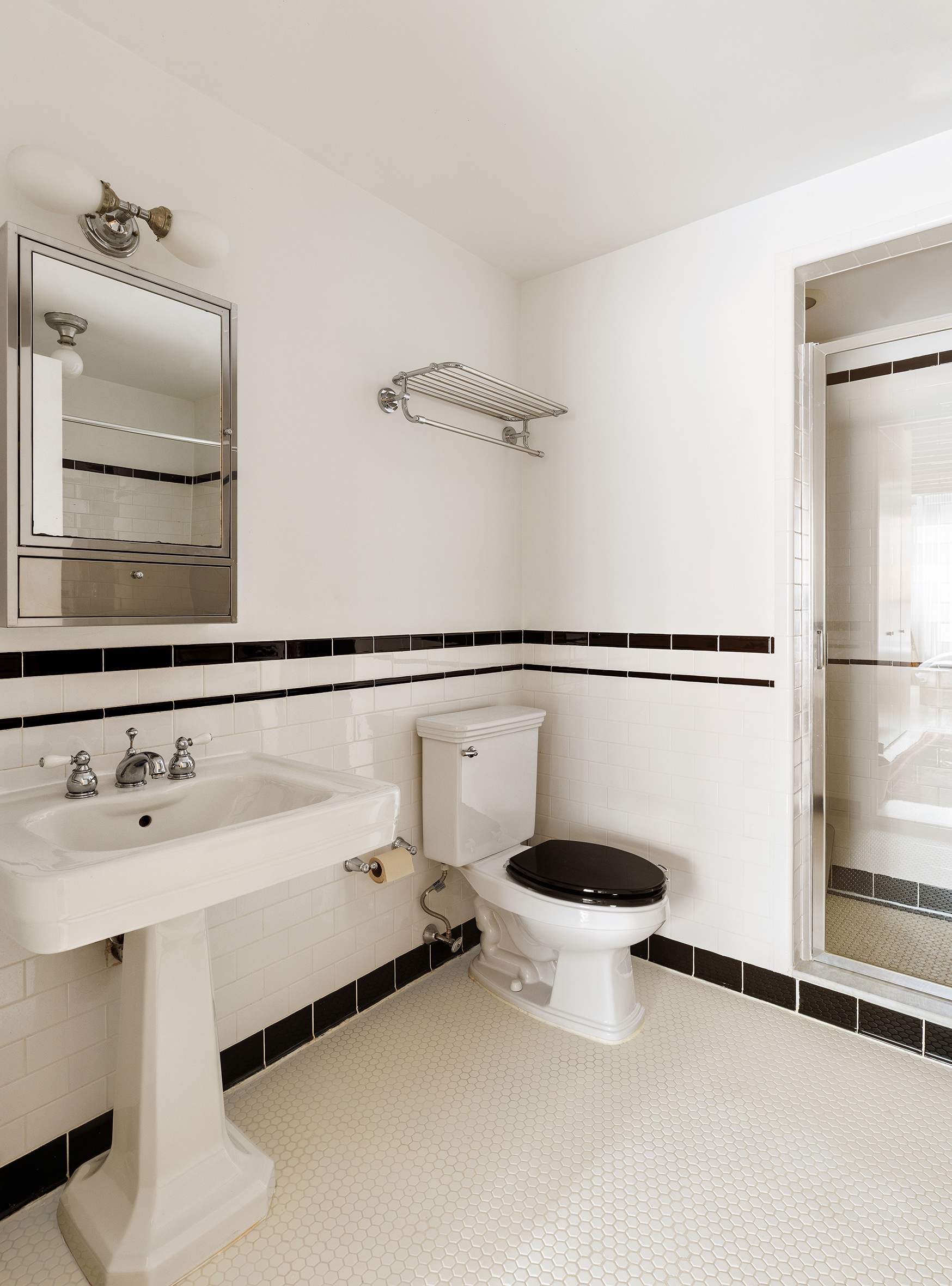 48 Canal Street, Unit 4 Manhattan, NY 10002 - Photo 9 of 13 a bathroom with a sink and a mirror