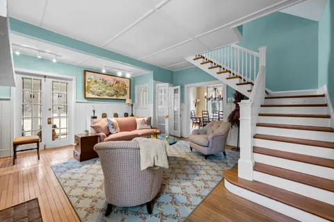 a bathroom with a bathtub and shower