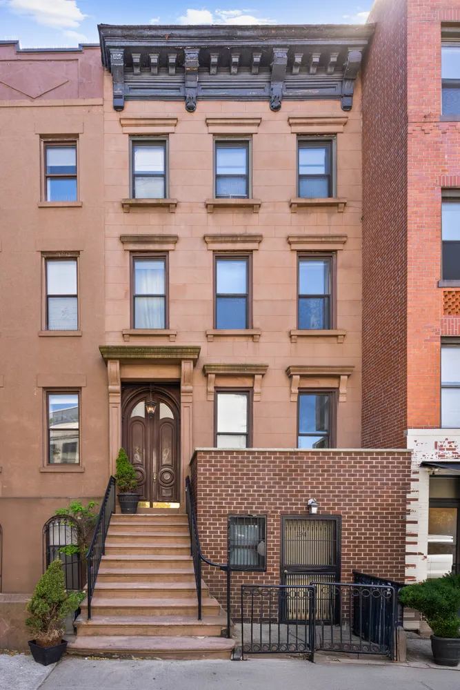 a front view of a house with a porch