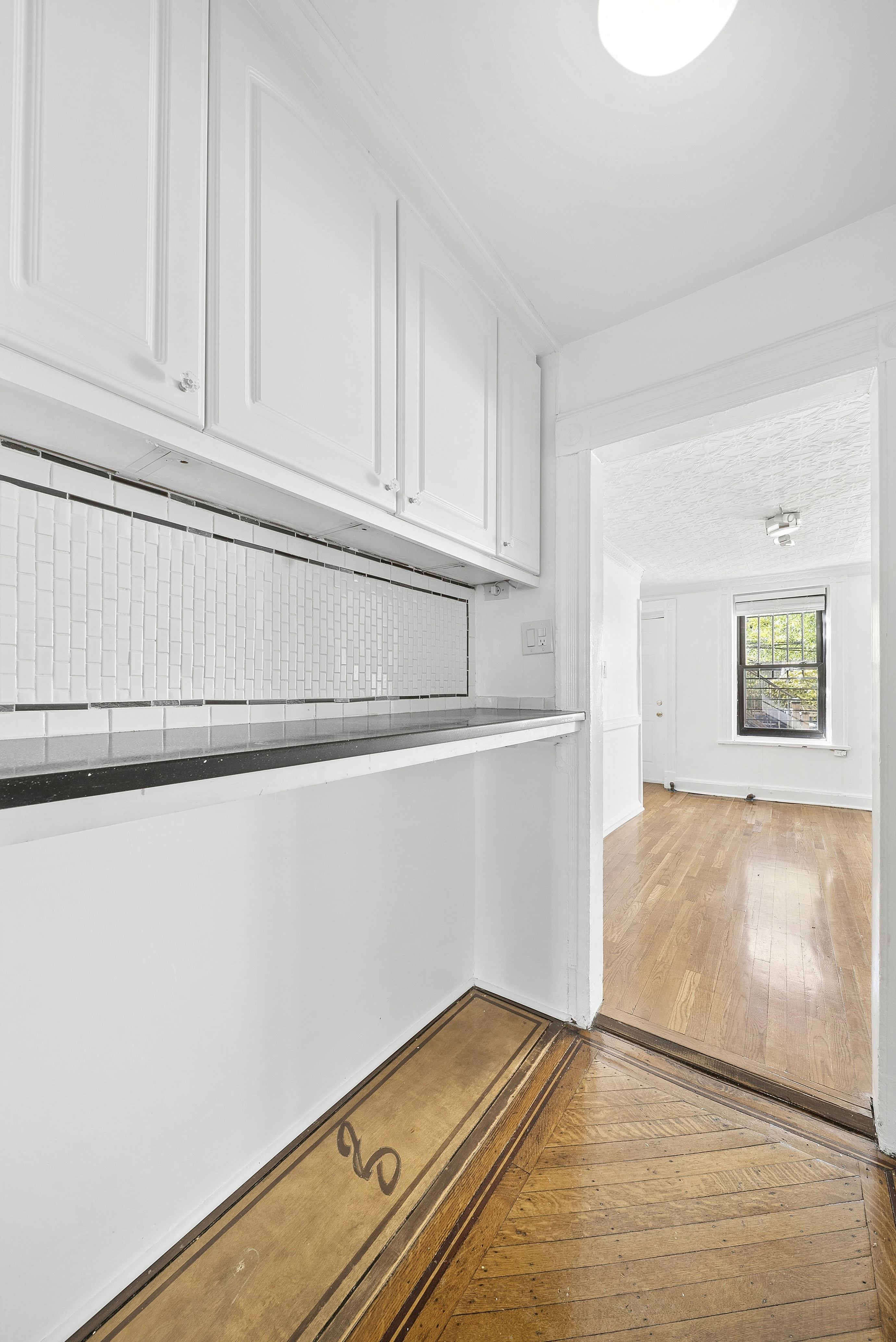 490 A Monroe Street, Unit apt.1 Brooklyn, NY 11221 - Photo 6 of 12 a view of kitchen with wooden floor