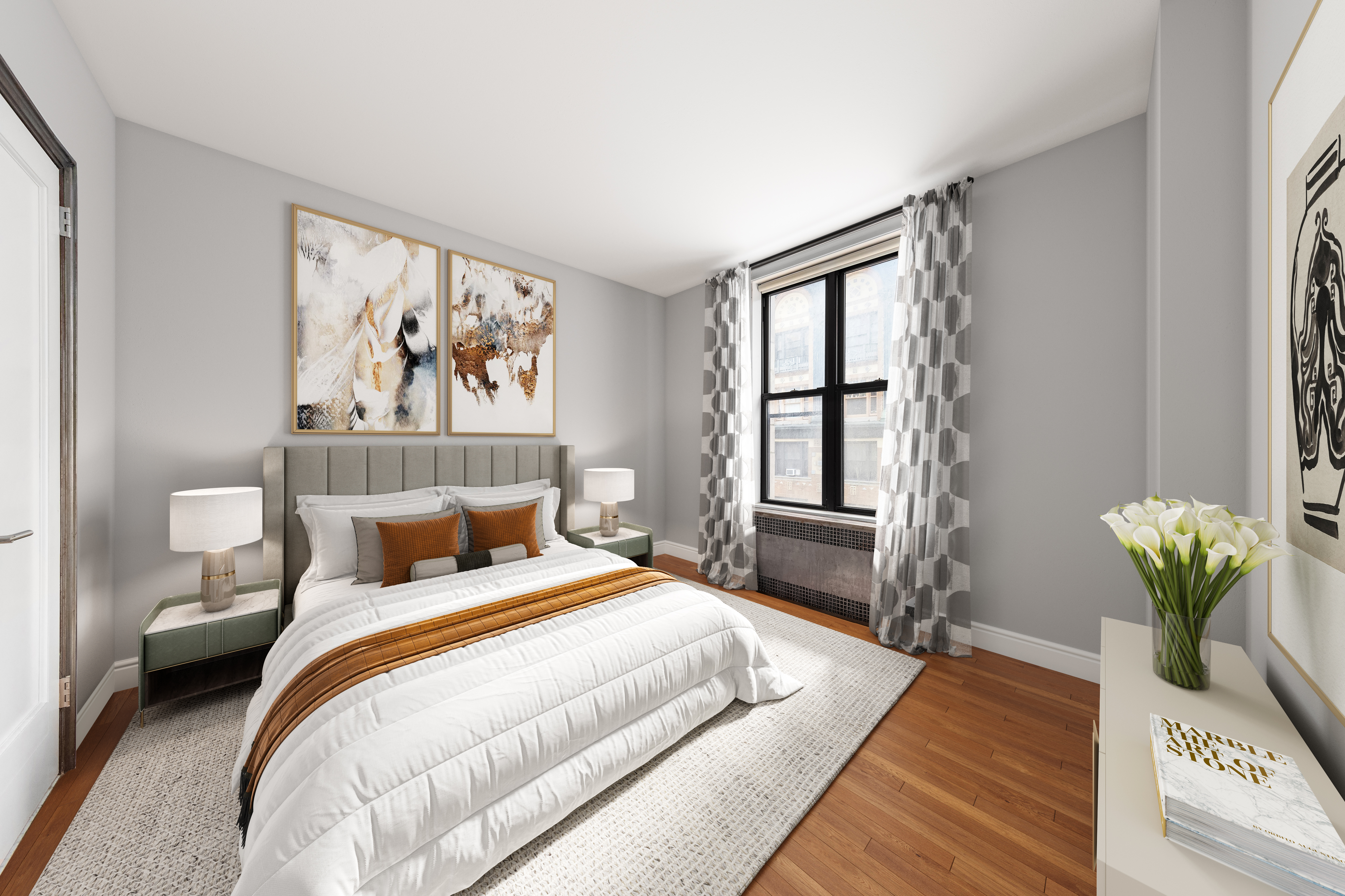 205 West 54th Street, Unit 10E Manhattan, NY 10019 - Photo 4 of 8 a bedroom with bed and a window