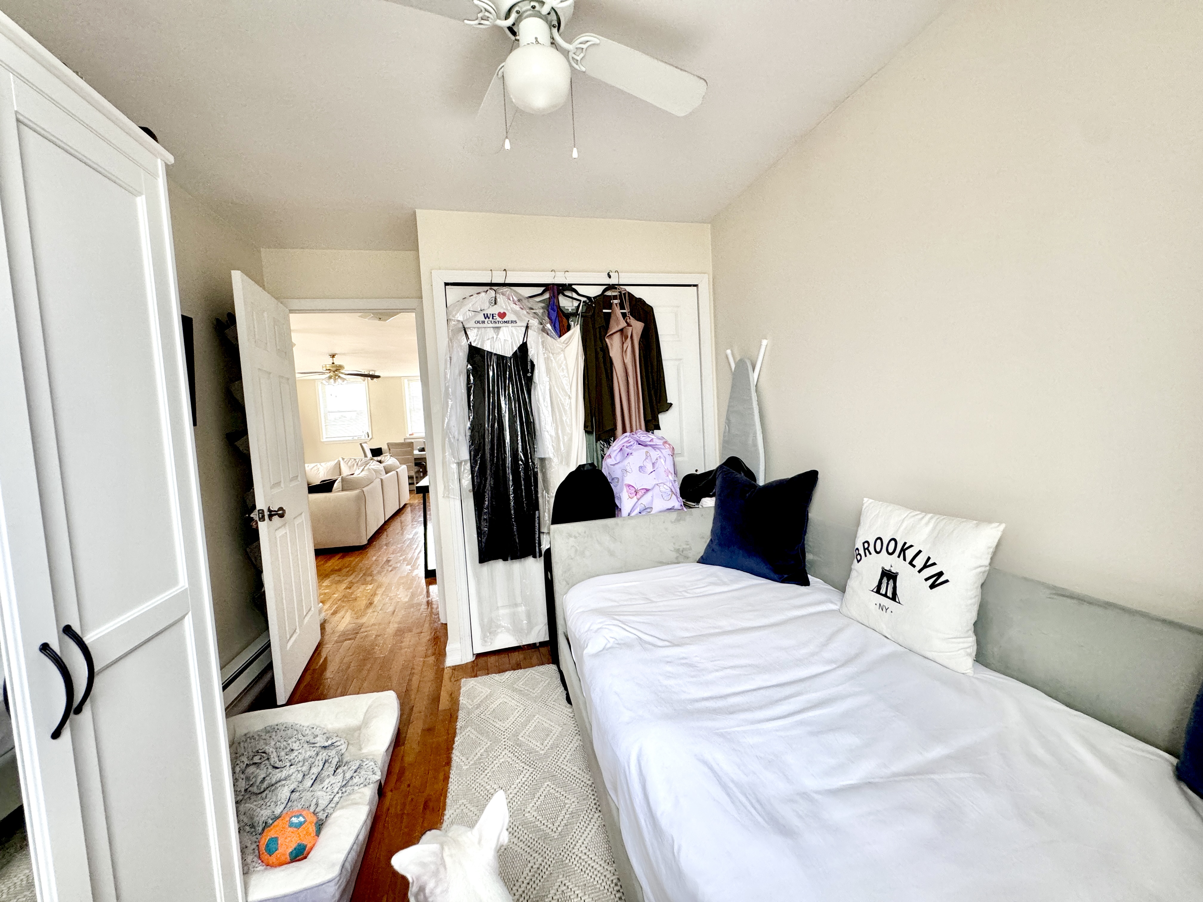 4 Gotham Avenue, Unit 2 Brooklyn, NY 11229 - Photo 4 of 6 a bedroom with a bed and a walk in closet
