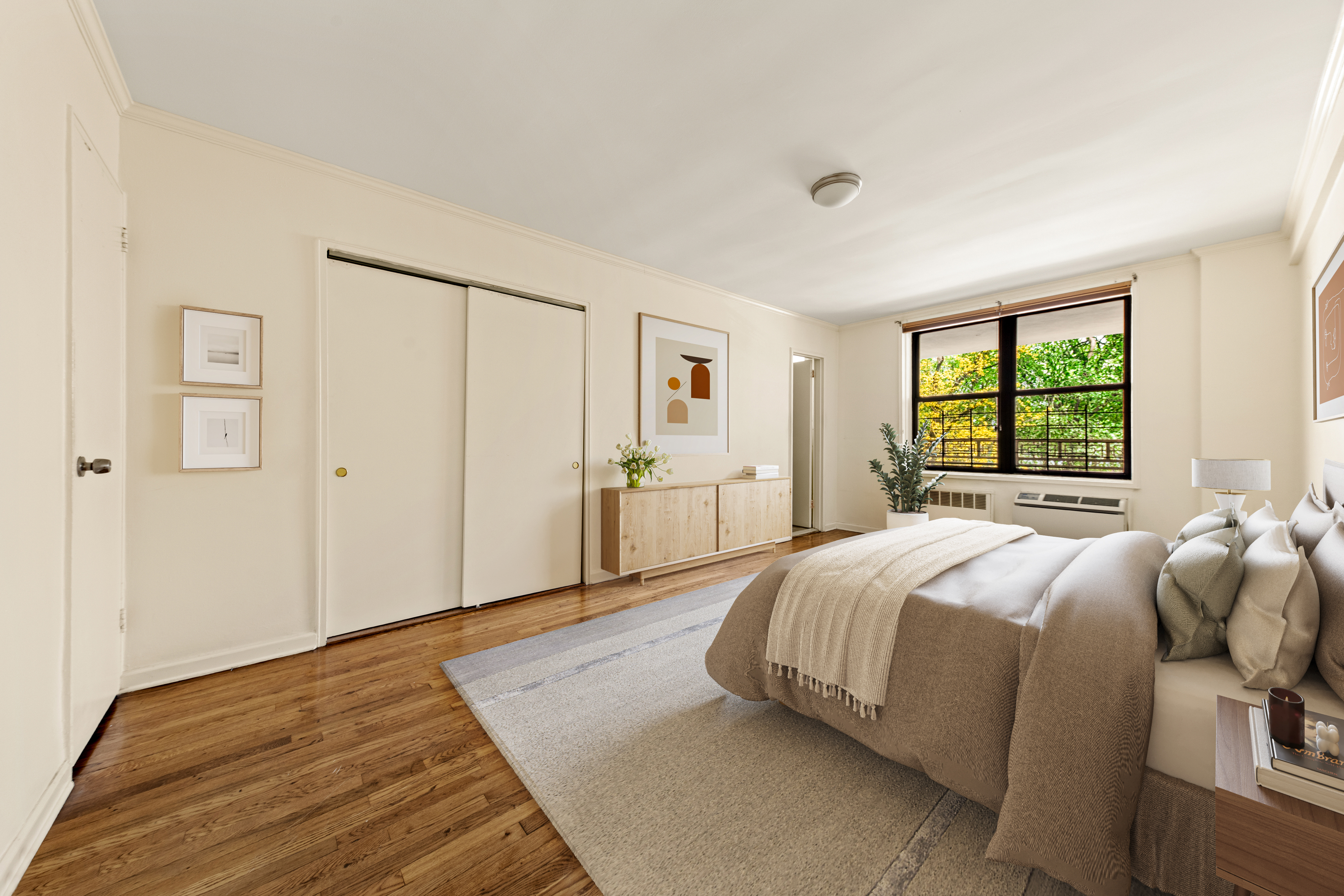 185 Prospect Park Southwest, Unit 301 Brooklyn, NY 11218 - Photo 4 of 9 a spacious bedroom with a bed and a window