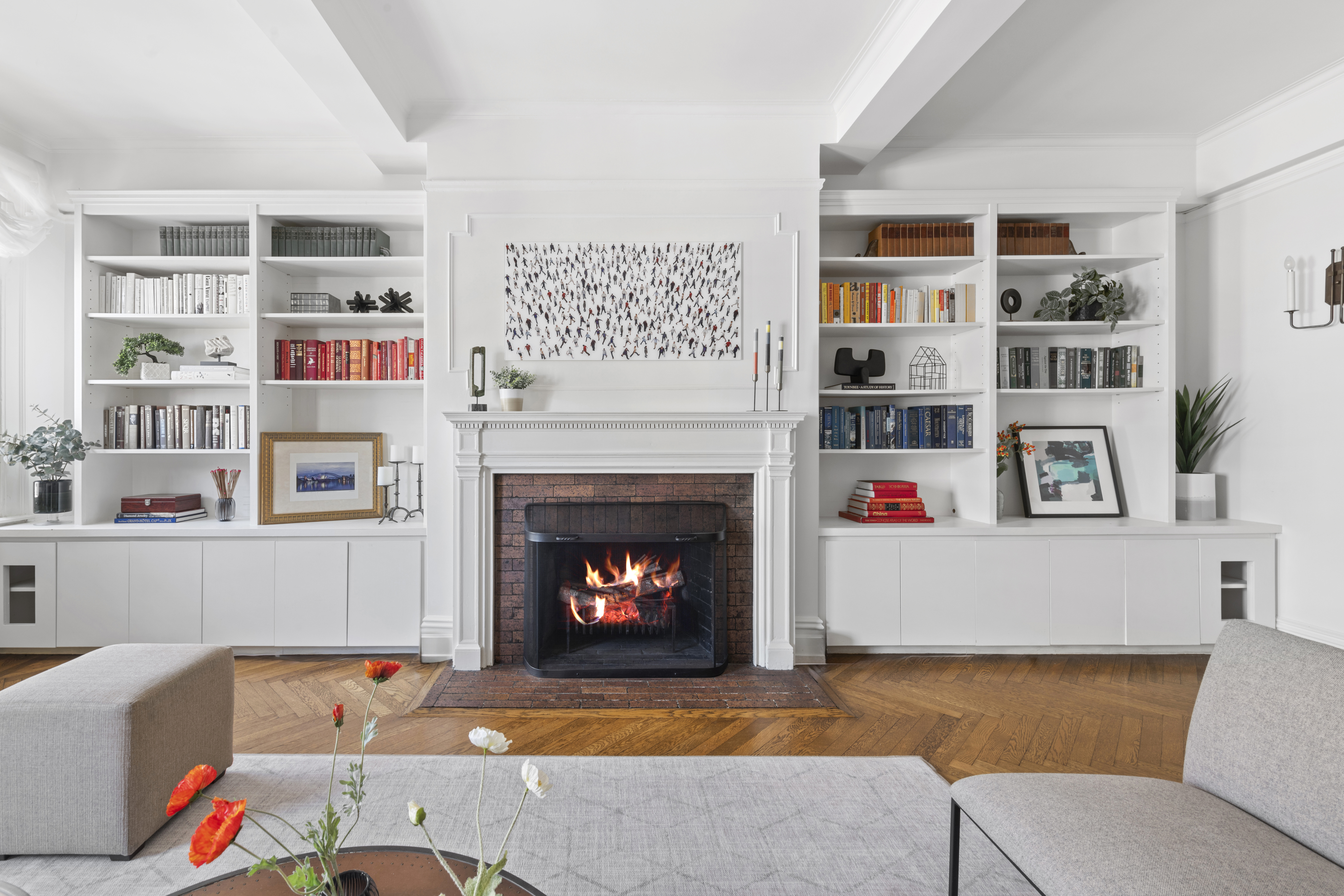 410 East 57th Street, Unit 15BE Manhattan, NY 10022 - Photo 14 of 18 a living room with furniture and a fireplace