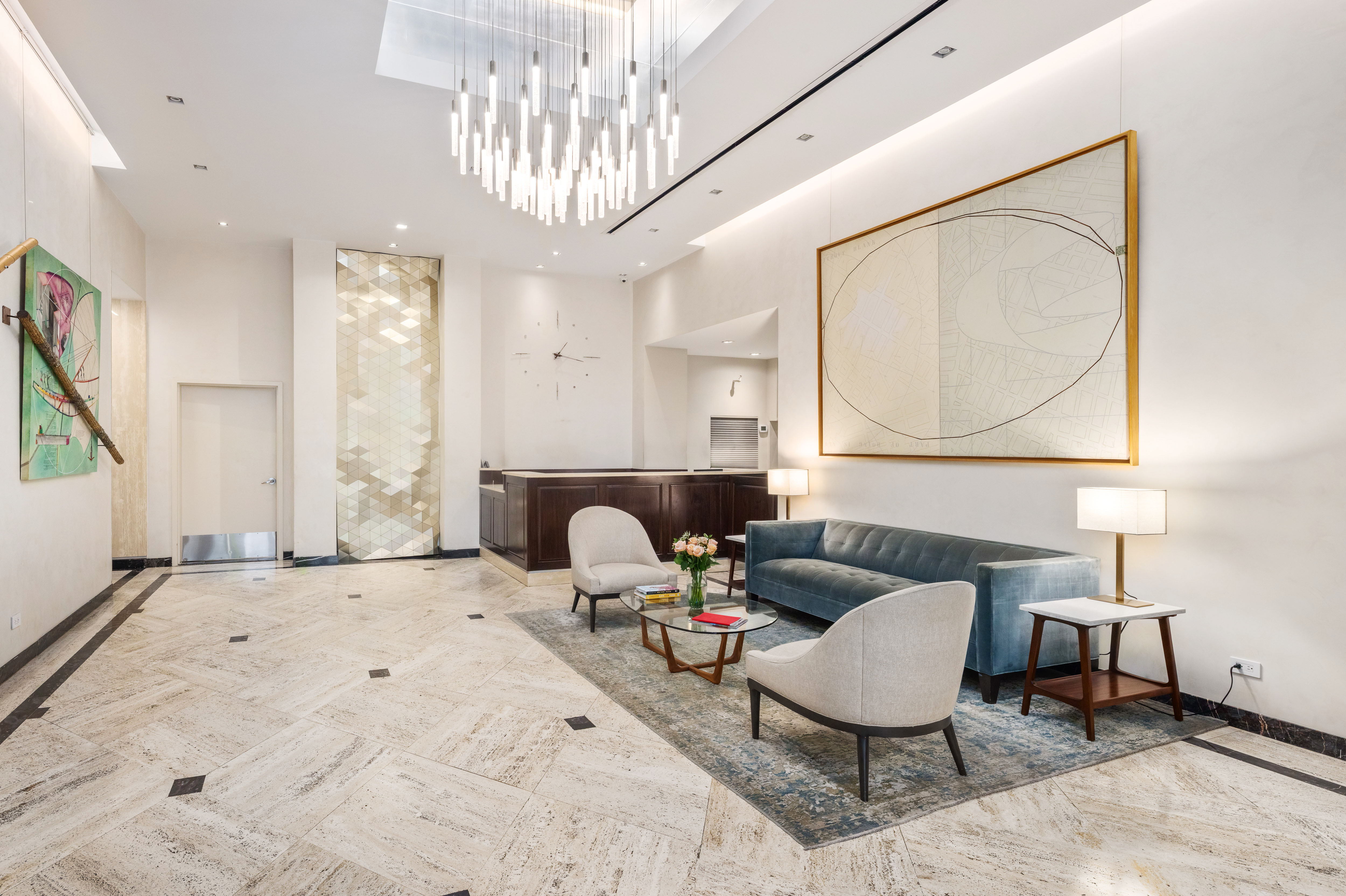 159 West 53rd Street, Unit 34E Manhattan, NY 10019 - Photo 14 of 15 a living room with furniture