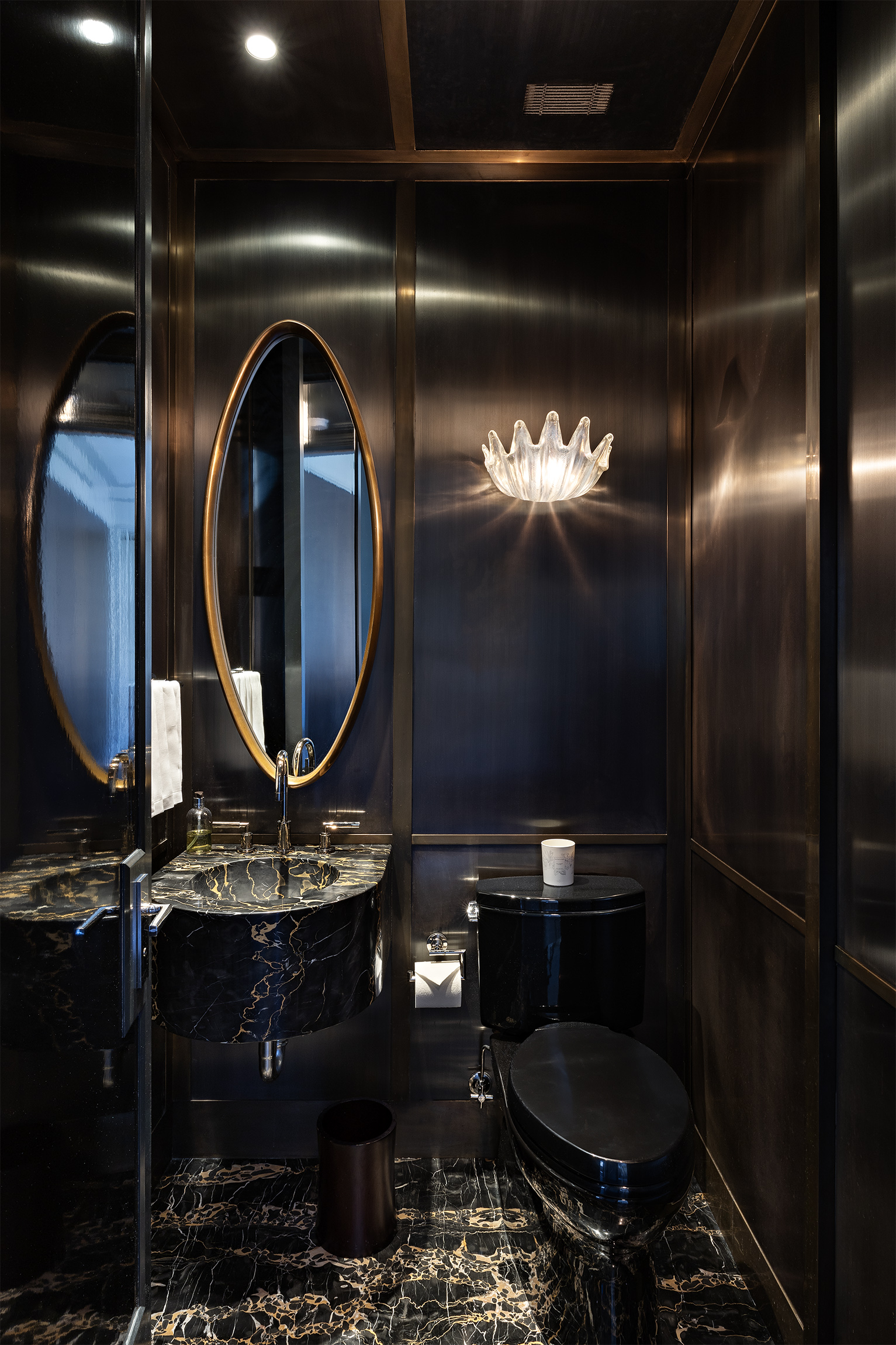 2 East 70th Street, Unit 4A Manhattan, NY 10021 - Photo 15 of 17 a bathroom with a mirror and vanity