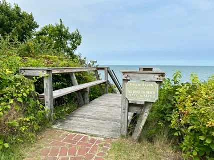 a view of a balcony with chairs