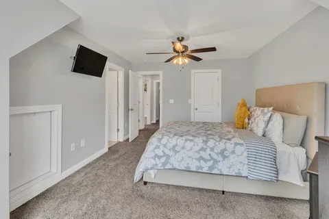 a bathroom with a bathtub and a toilet