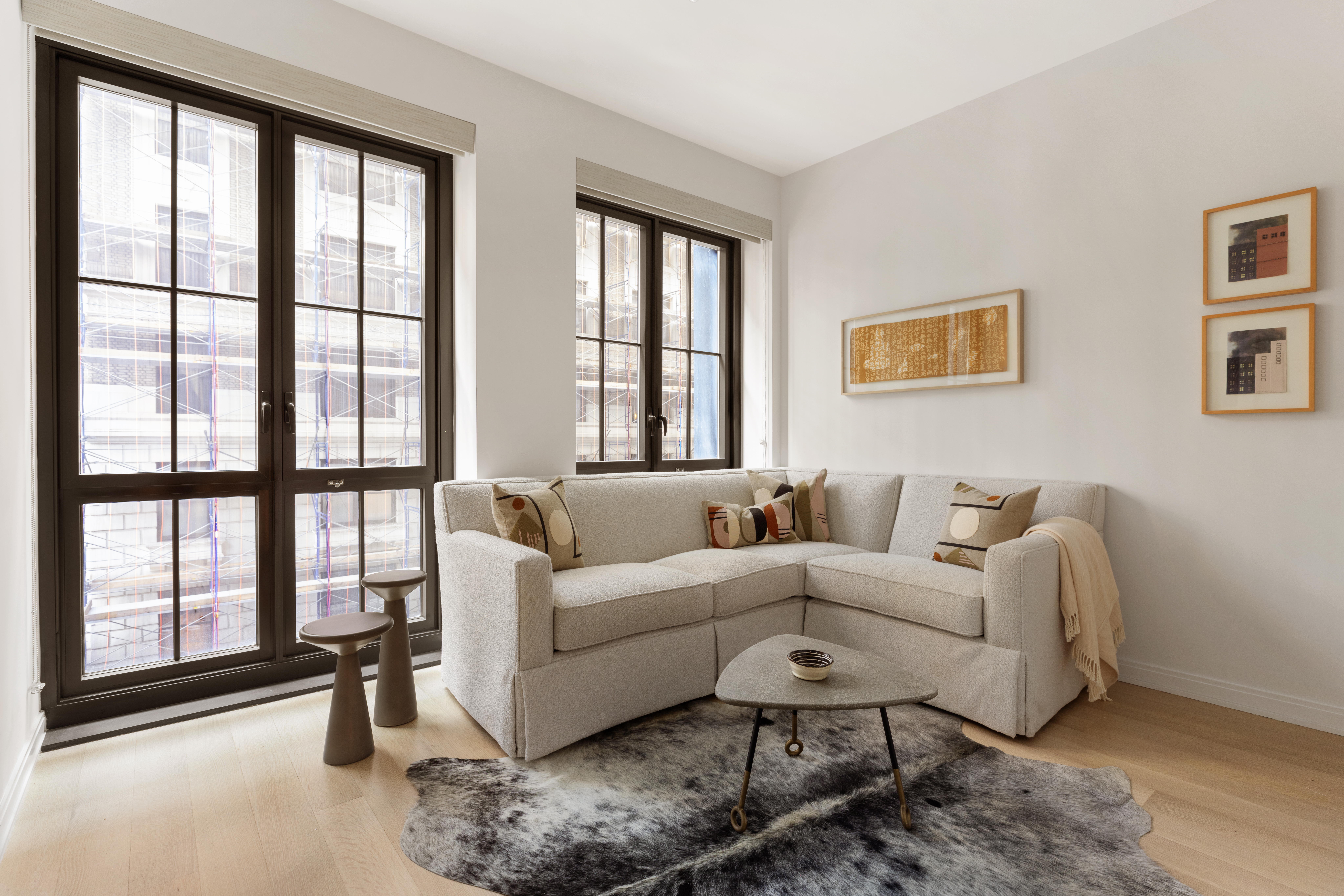 221 West 77th Street, Unit 4E Manhattan, NY 10024 - Photo 6 of 20 a living room with furniture and a large window