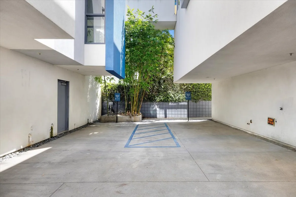 a view of a house with a yard and garage