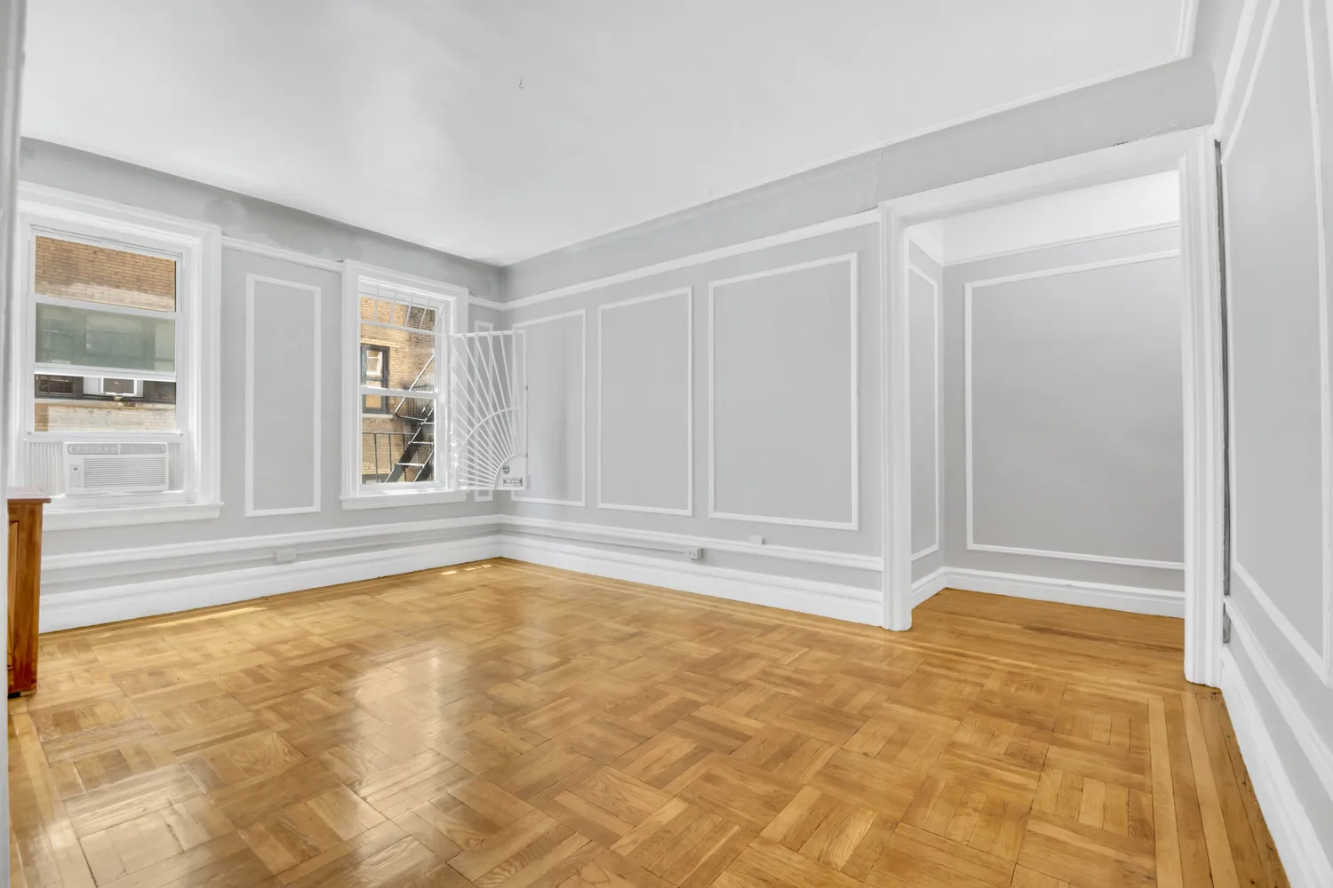 a view of an empty room with a window