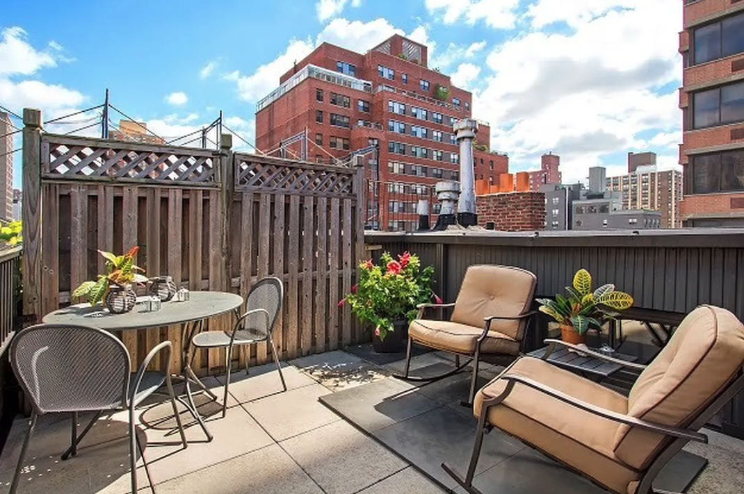 160 East 26th Street, Unit 6B Manhattan, NY 10010 - Photo 1 of 10 a couple of chairs sitting in patio with a table and chairs