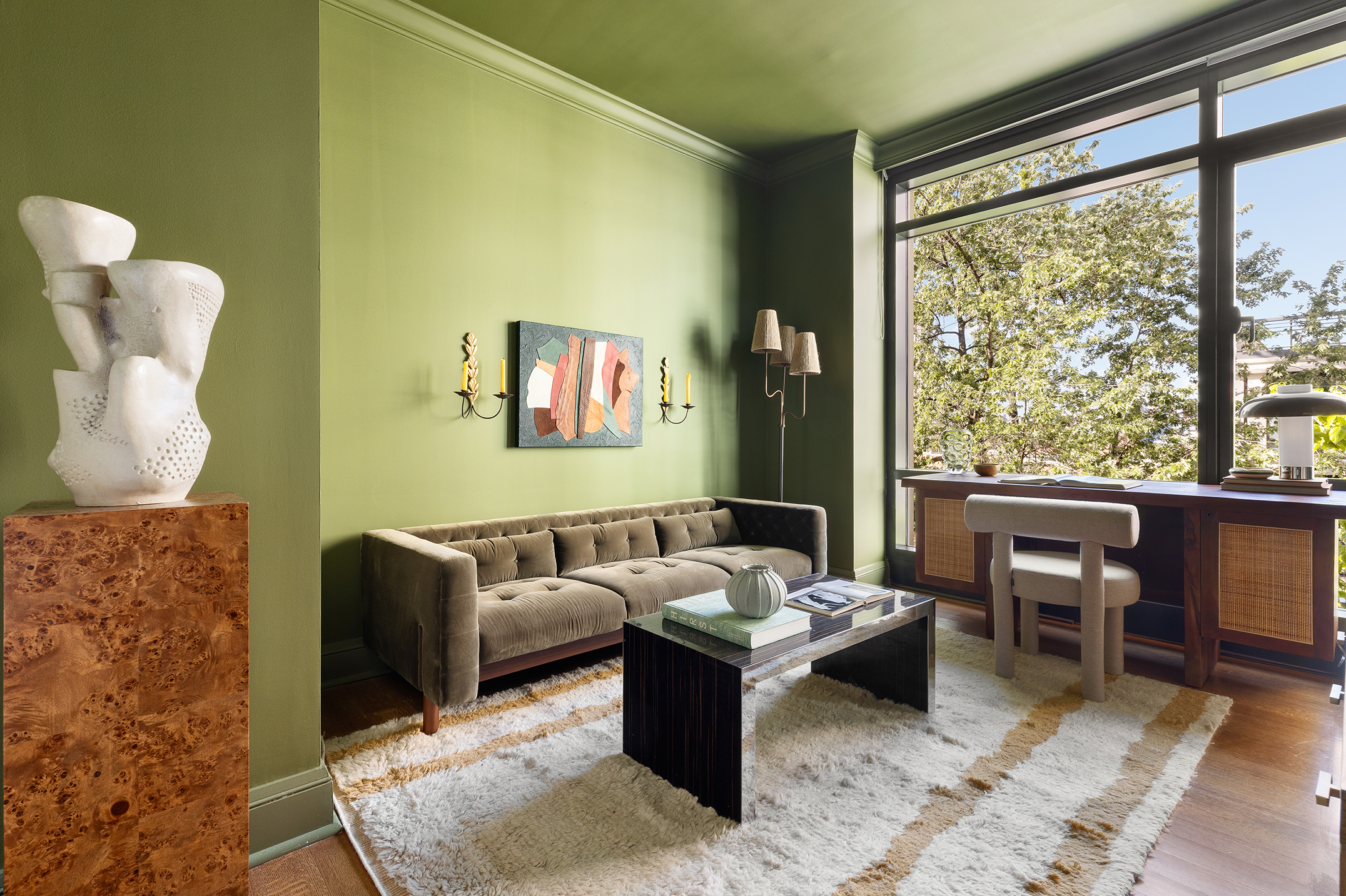 170 East End Avenue, Unit 7A Manhattan, NY 10128 - Photo 9 of 35 a living room with furniture and a large window