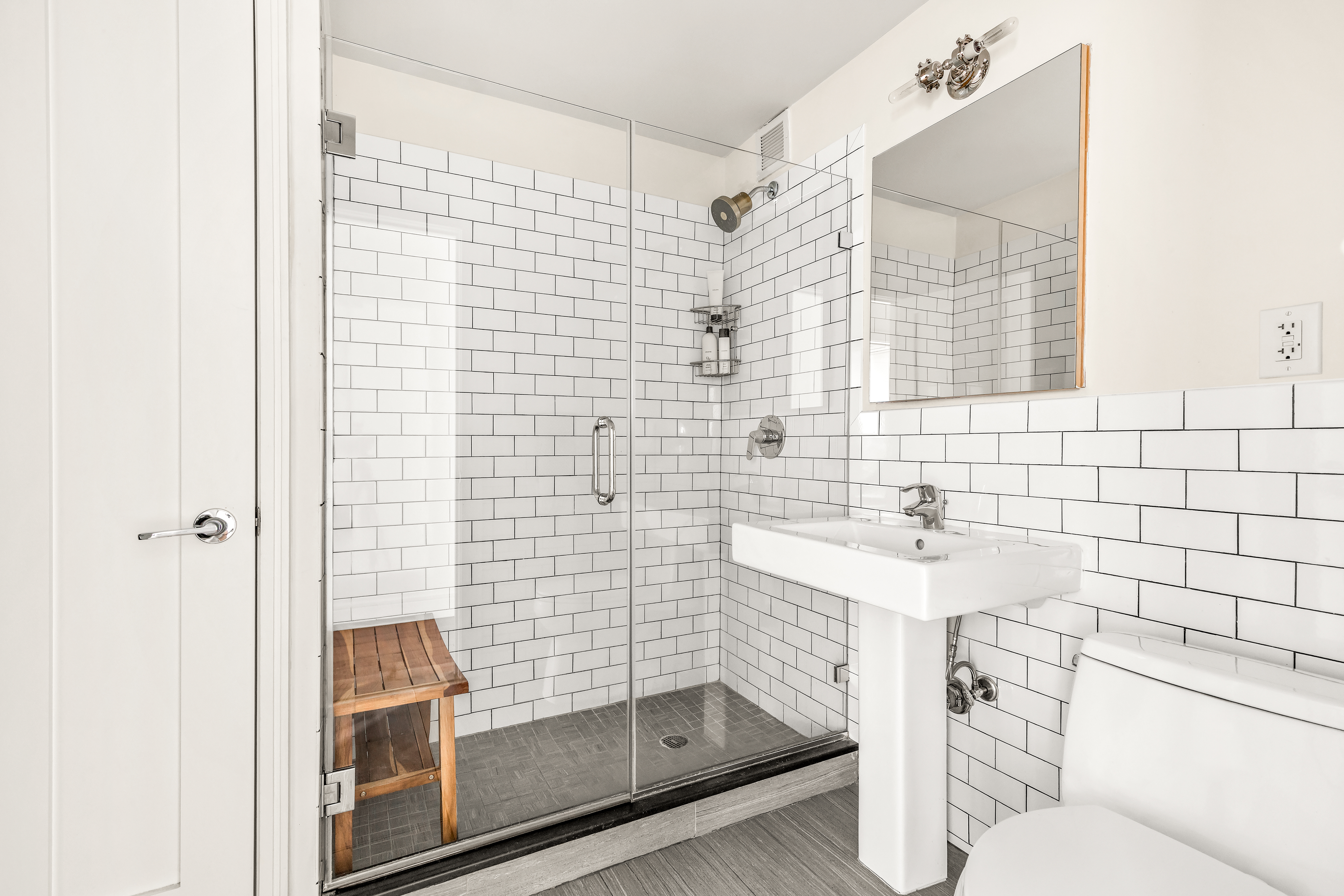 264 Water Street, Unit 6C Manhattan, NY 10038 - Photo 7 of 9 a bathroom with a shower