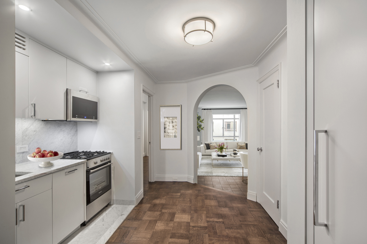 25 Central Park West, Unit 4U Manhattan, NY 10023 - Photo 3 of 8 a view of a kitchen cabinets and wooden floor