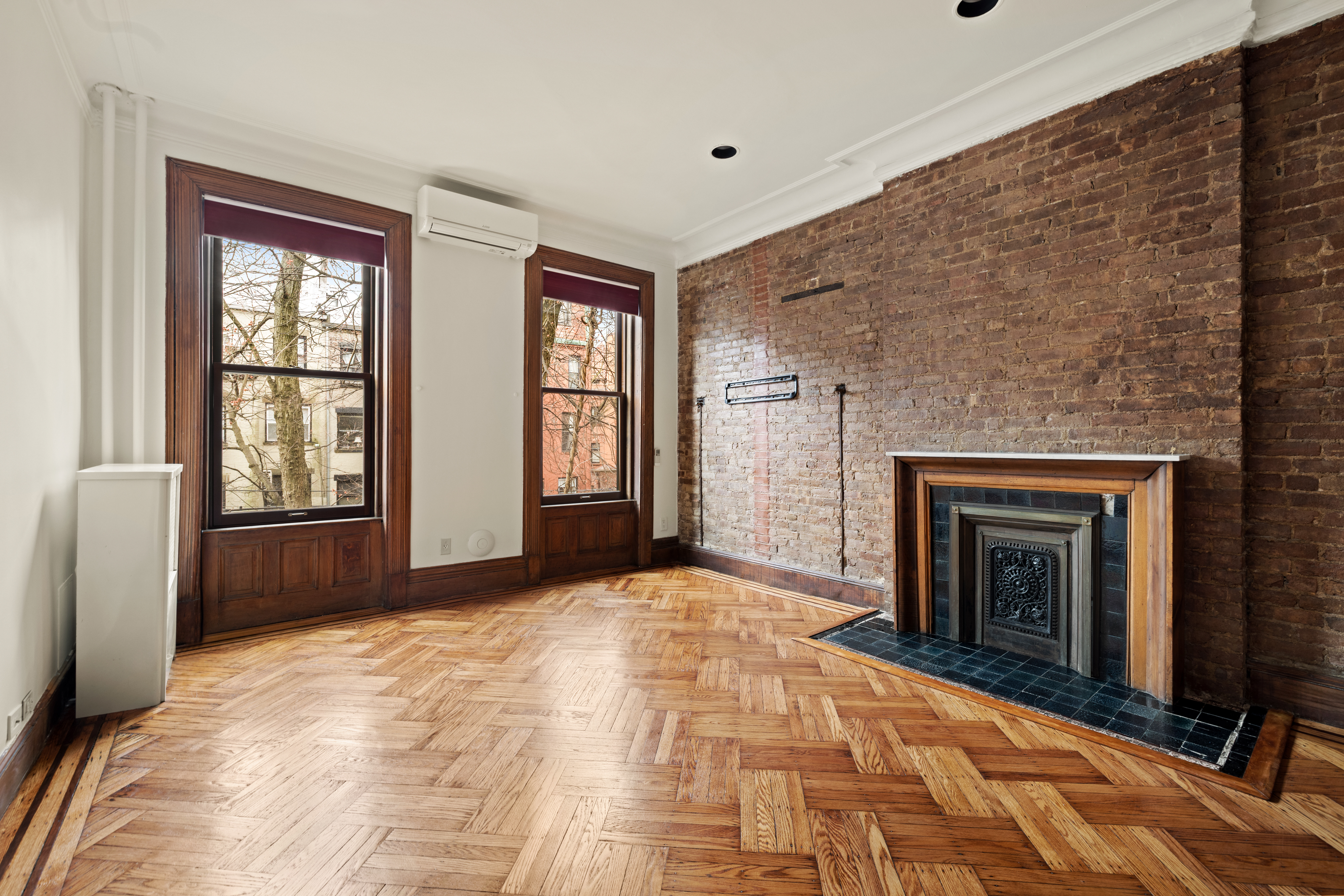 906 President Street, Unit 1 Brooklyn, NY 11215 - Photo 9 of 18 a view of an empty room with window and fire place