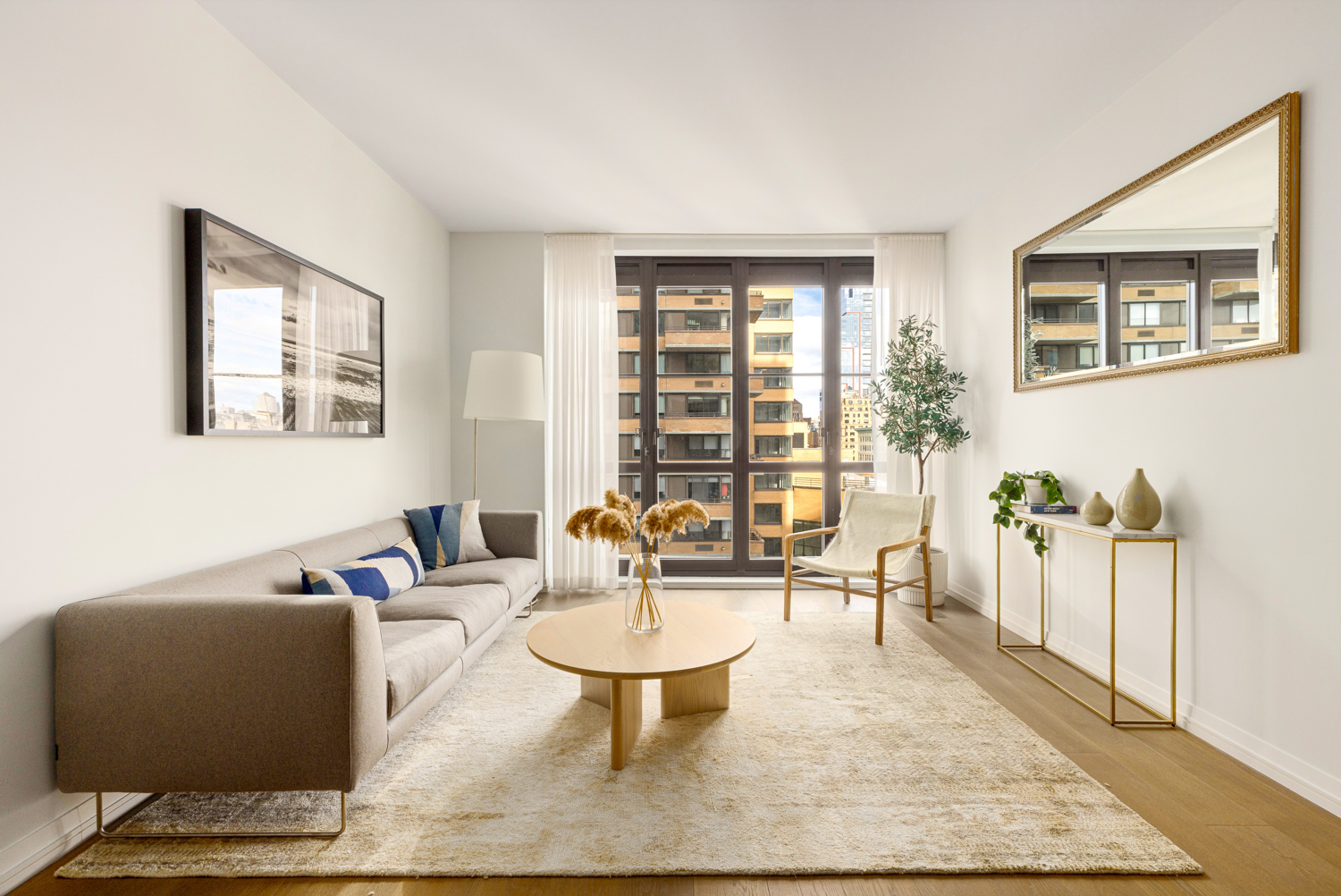 a living room with furniture and a rug