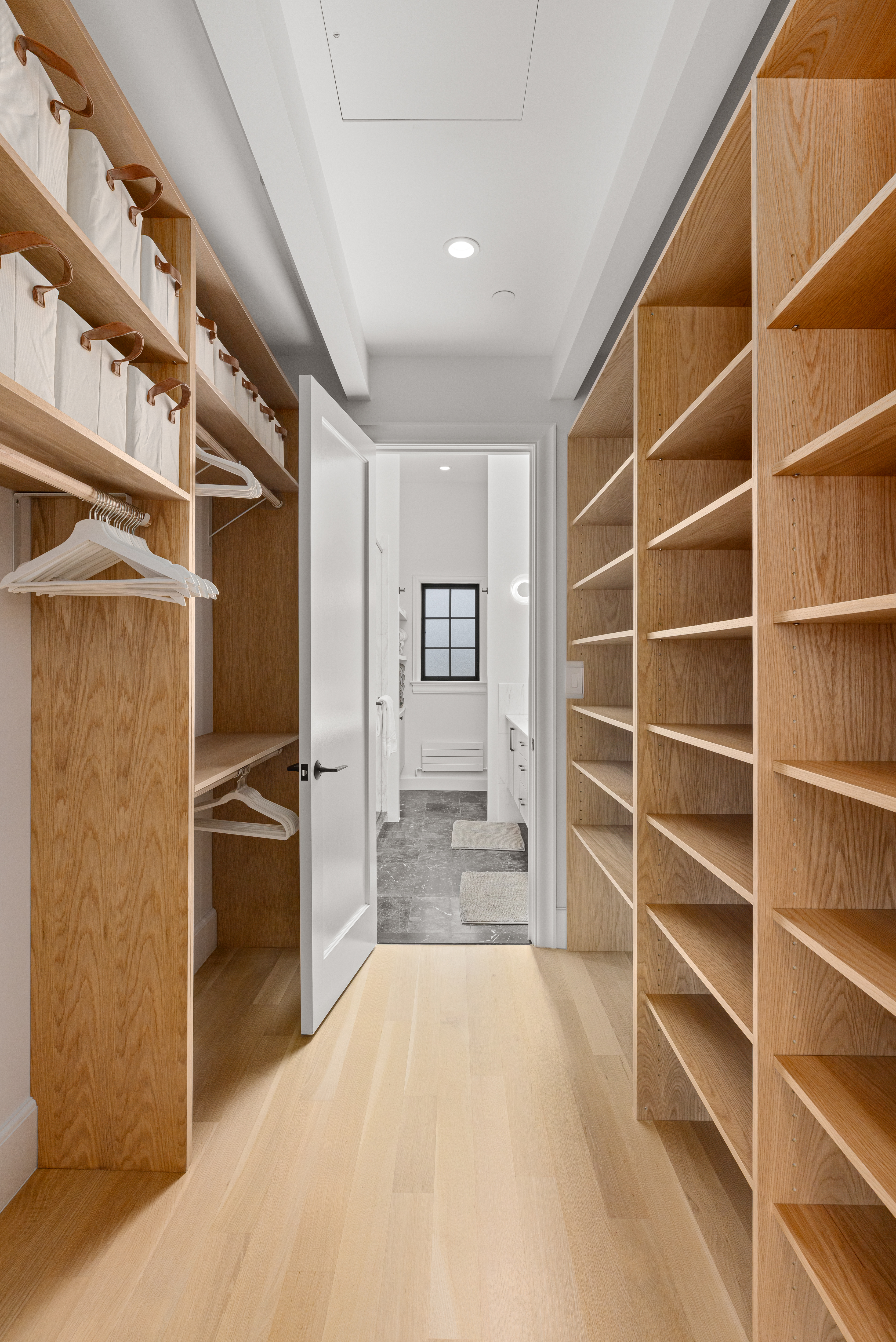 179 Devoe Street Brooklyn, NY 11211 - Photo 9 of 20 a view of walk in closet with empty racks